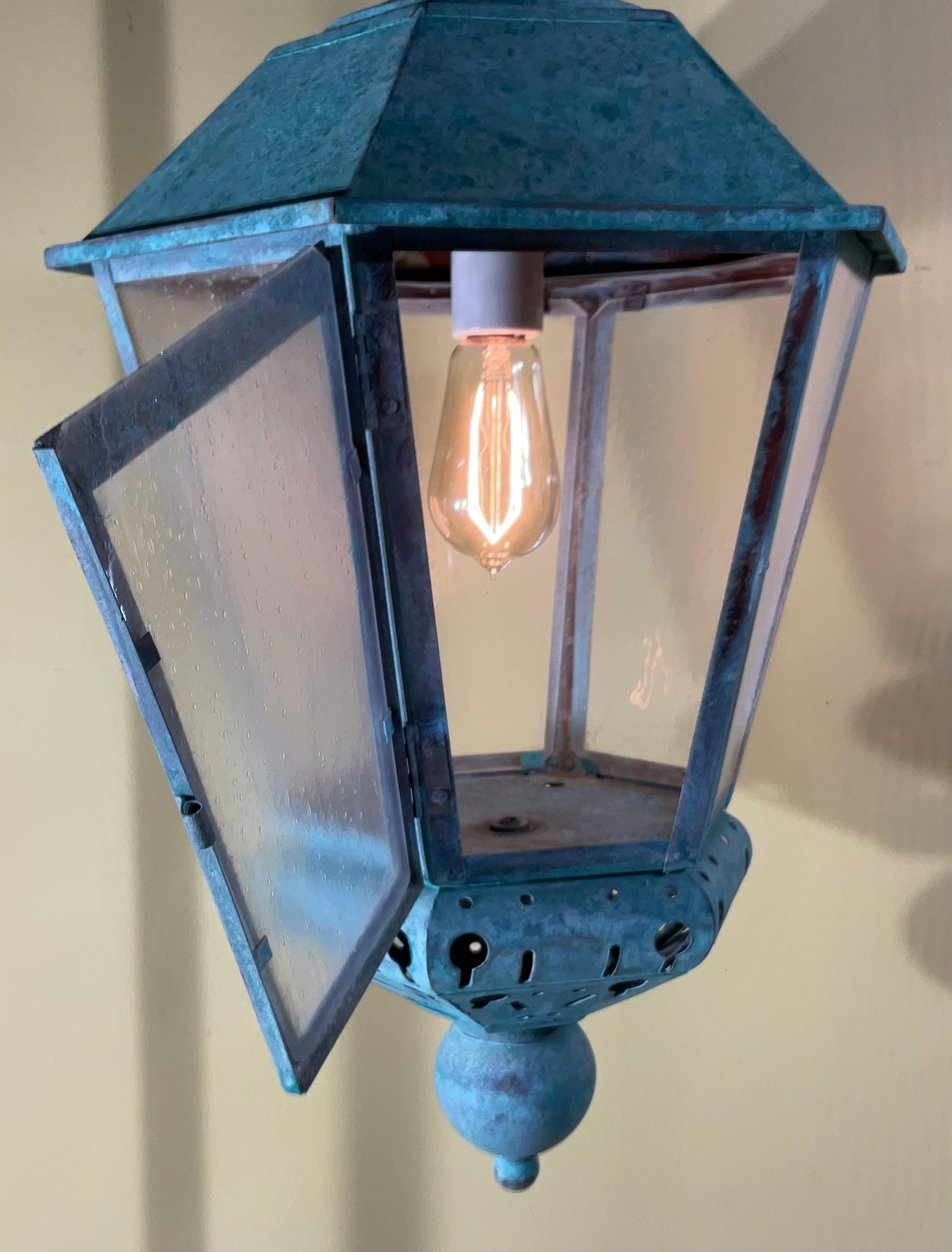 

Step back in time with this beautiful, solid copper verdigris lantern, a true testament to timeless craftsmanship. This piece is not merely a light source; it's a piece of funky art , With its striking verdigris patina, a highly sought-after