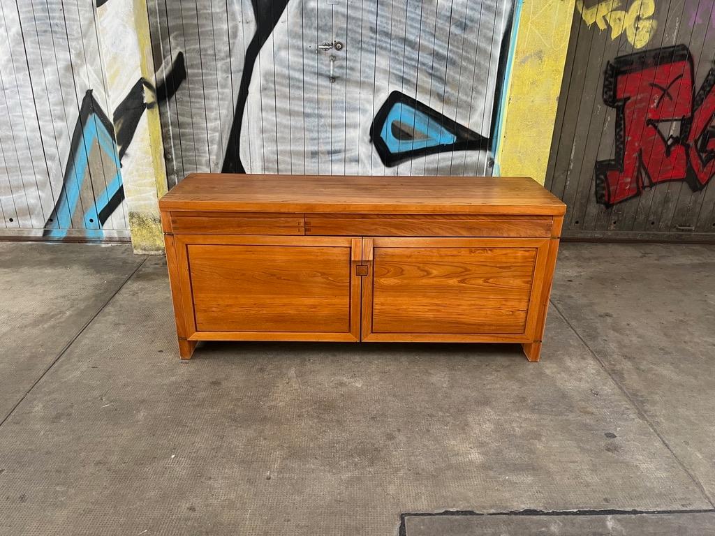 Vintage solid elm wood R08 sideboard by Pierre Chapo made in France ca. 1960s
Beautiful patina, color and veining.

Launched in 1964, the R08's proportions make it one of the most accomplished sideboards of its generation. 
The system that locks the