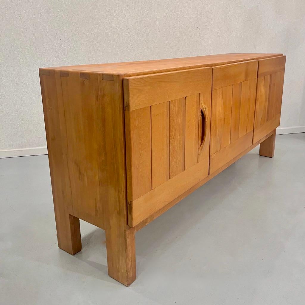 French Vintage solid elm sideboard by Maison Regain, France ca. 1960s For Sale
