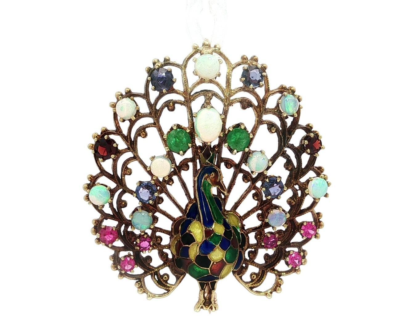 –Stone(s)–
Numerous Natural Genuine Opal, Emerald, Garnet, Pink & Blue Sapphire - Round Faceted & Cabochon Cut - Multi Prong Set - Multi Colors

Material: 14k Yellow Gold w/ Multi Color Enamel Work
Weight: 14.2 Grams
Overall Width: 41.9mm (1.6