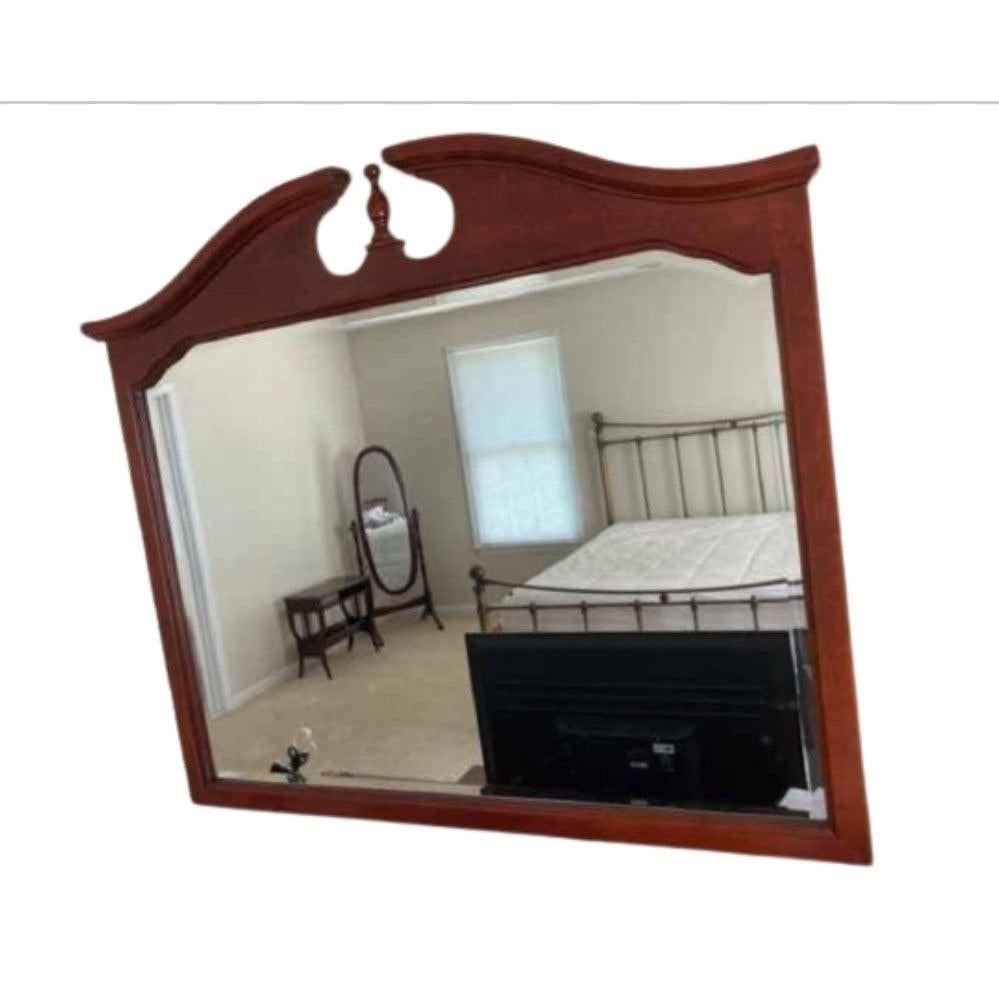 Solid Mahogany frame wall mirror.
Beveled edge Mirror. Excellent condition. Measures 50 inches in width by 41 inches in height.
   