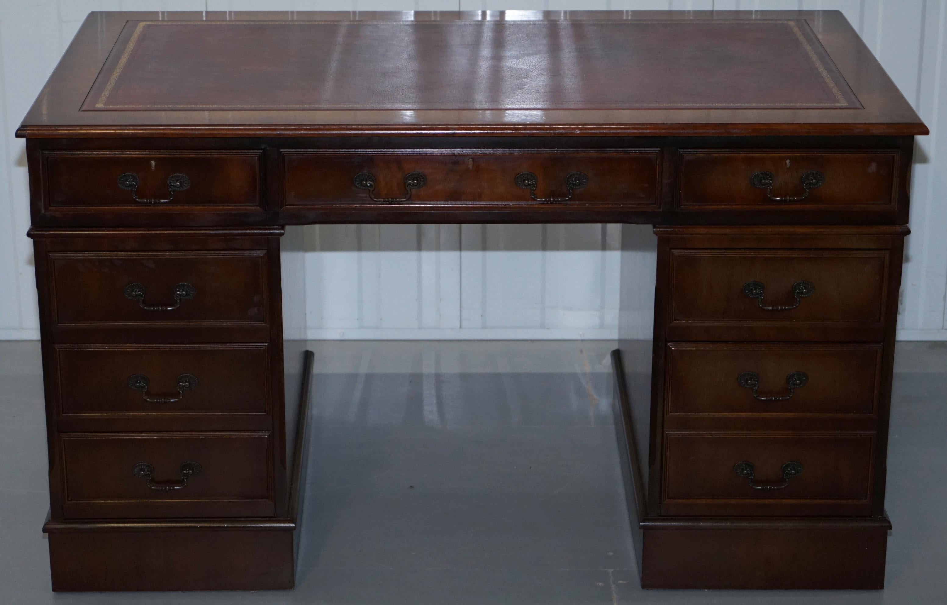 We are delighted to offer for sale this lovely solid Mahogany and pippy oak with oxblood leather writing surface twin pedestal partner desk

This desk has the tradition drawer formation which is all standard drawers and one bottom right double
