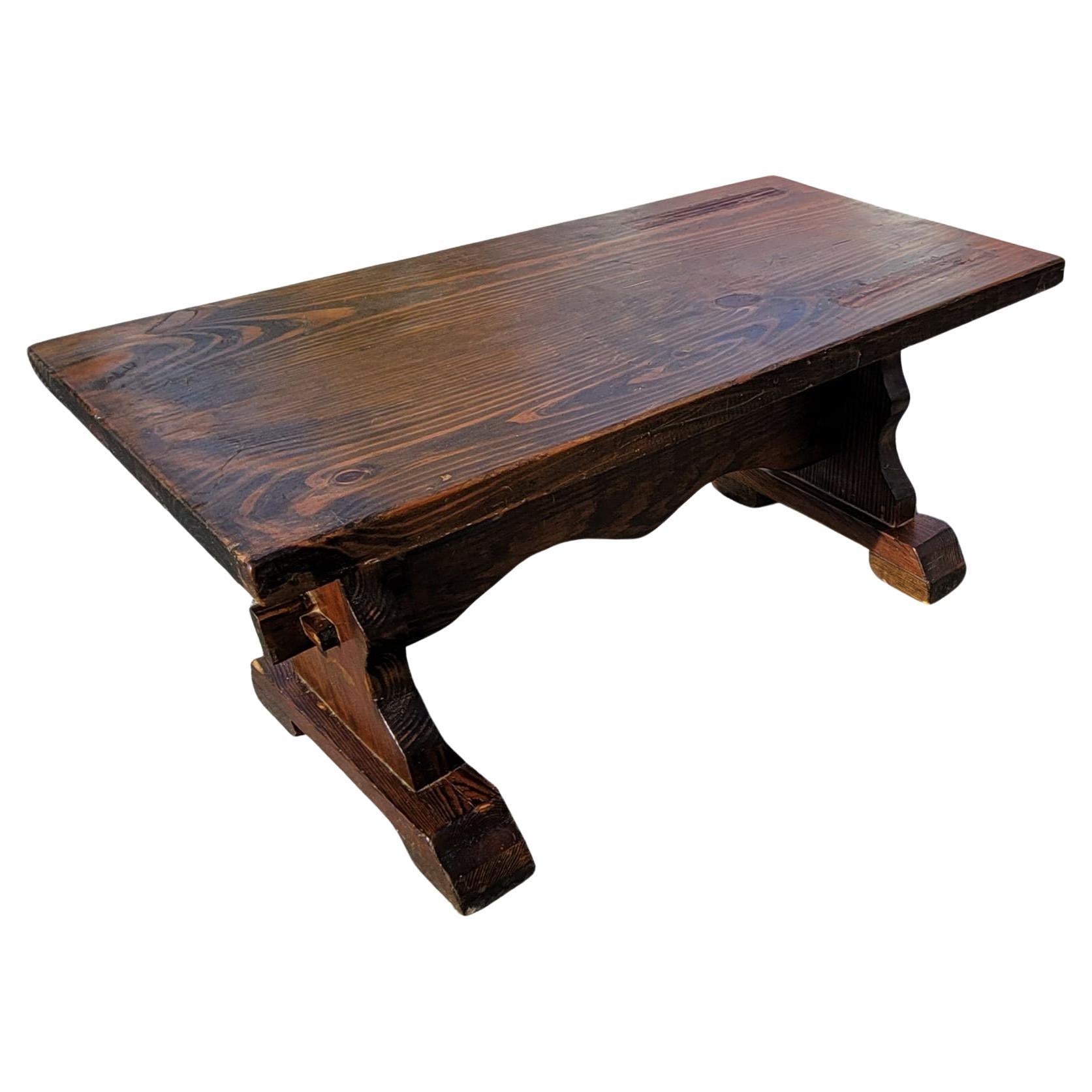 Jacobean style trestle cocktail or coffee Table. Very Sturdy Heavy Solid Oak Construction. Nice Oak Graining To Top Strong Lyre Shaped End Supports Middle Stretcher With End Pegs. A Good Quality Vintage Coffee Table That Will Add Charm To Any Room!.
