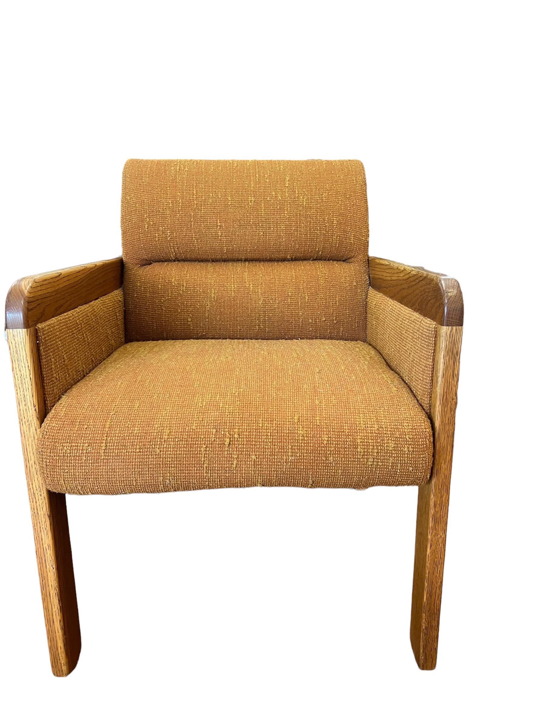 Vintage solid oak upholstered Mid-Century Modern sofa chair with original vintage upholstery.

Measures: 24W 28D 34H
SW 22 SD19 SH 18.