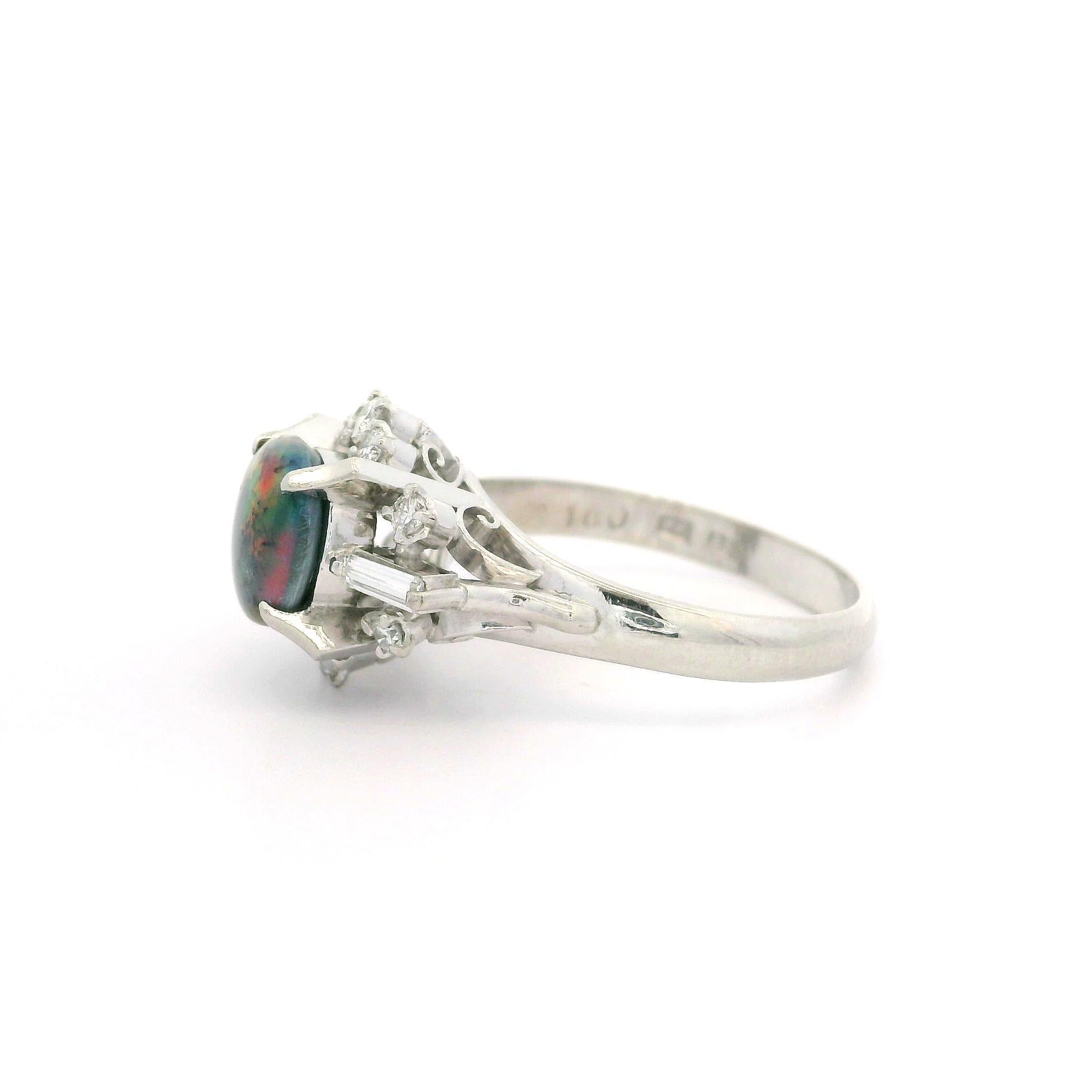 Vintage Solid Platinum GIA 1.30ctw Cabochon Black Opal w/ Diamond Cocktail Ring In Excellent Condition For Sale In Montclair, NJ