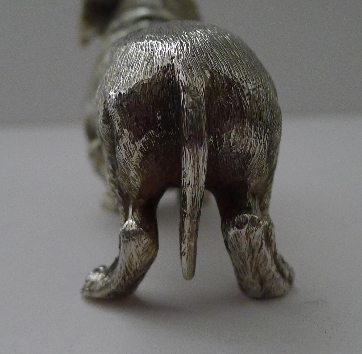 A magnificent solid cast (not filled) English silver model of a Dachshund, beautifully executed and one of the most sought-after castings by SMD castings, London.

The underside is fully hallmarked for London 1975 together with the makers mark