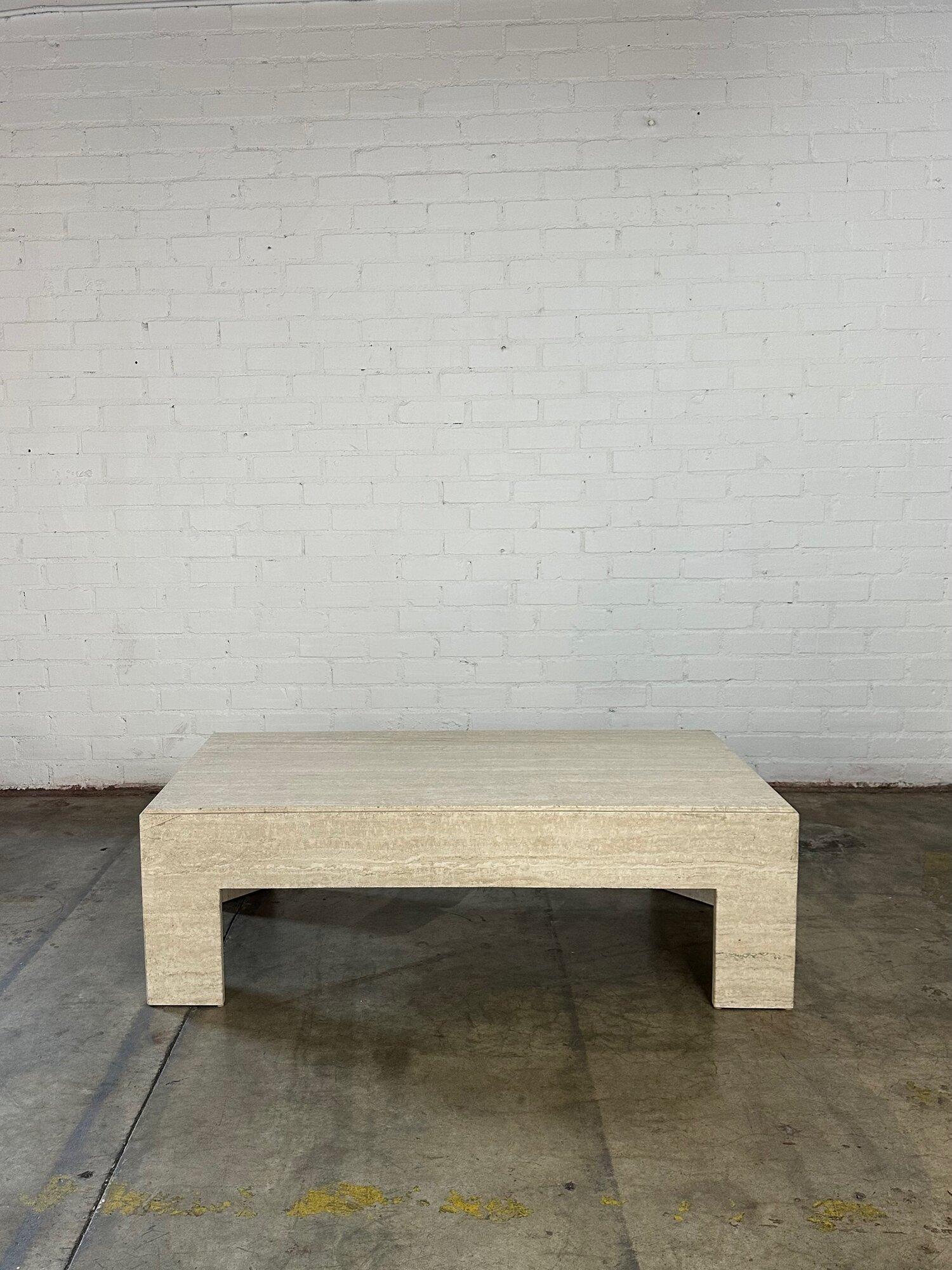 W60 D30 H19

Vintage honed travertine coffee table with details along the edges of the stone. This table is heavy but in good condition with minimal wear and chips.

