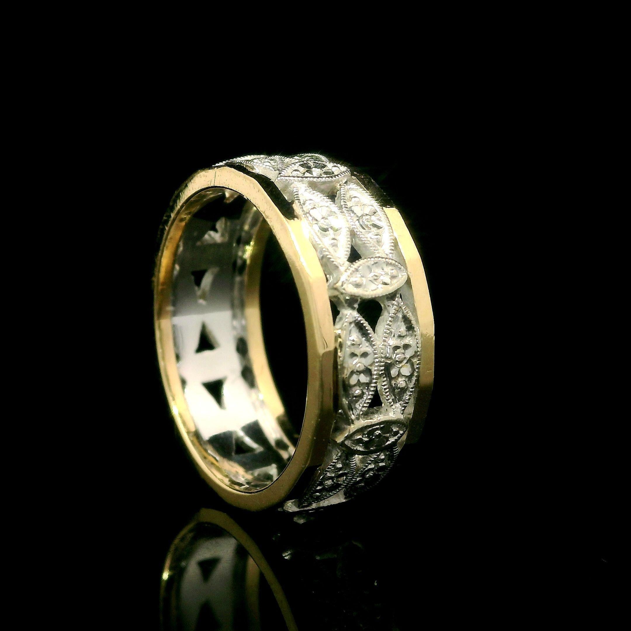 Material: Solid 14k Yellow Gold & White Gold Center
Weight: 5.57 Grams
Ring Size: 7.0 ( fitted on finger, item can NOT be sized)
Ring Width: 7.7mm (0.30