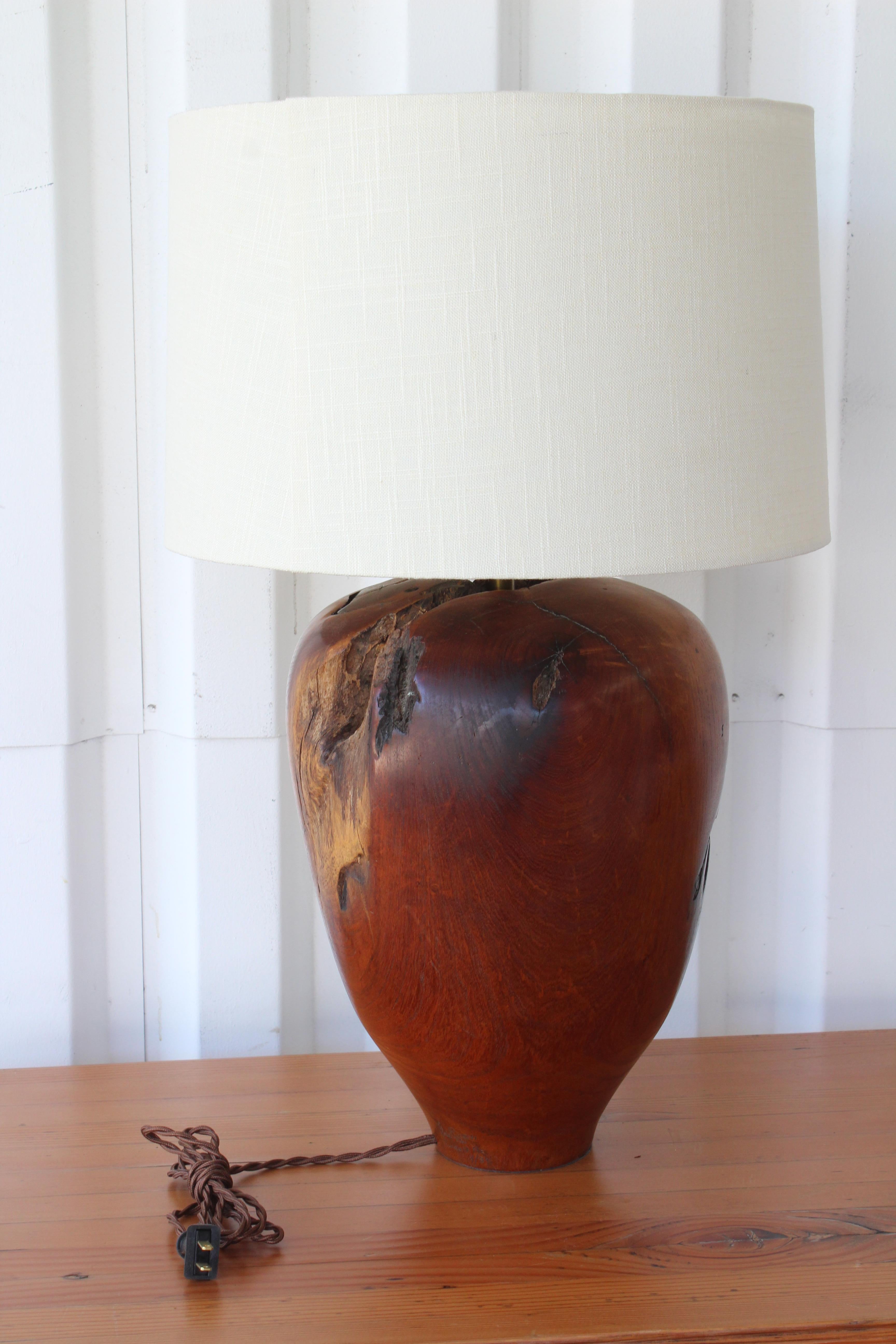 Vintage solid walnut table lamp, 1960s. Newly rewired with custom shade in Belgian linen. Measures: 25.5