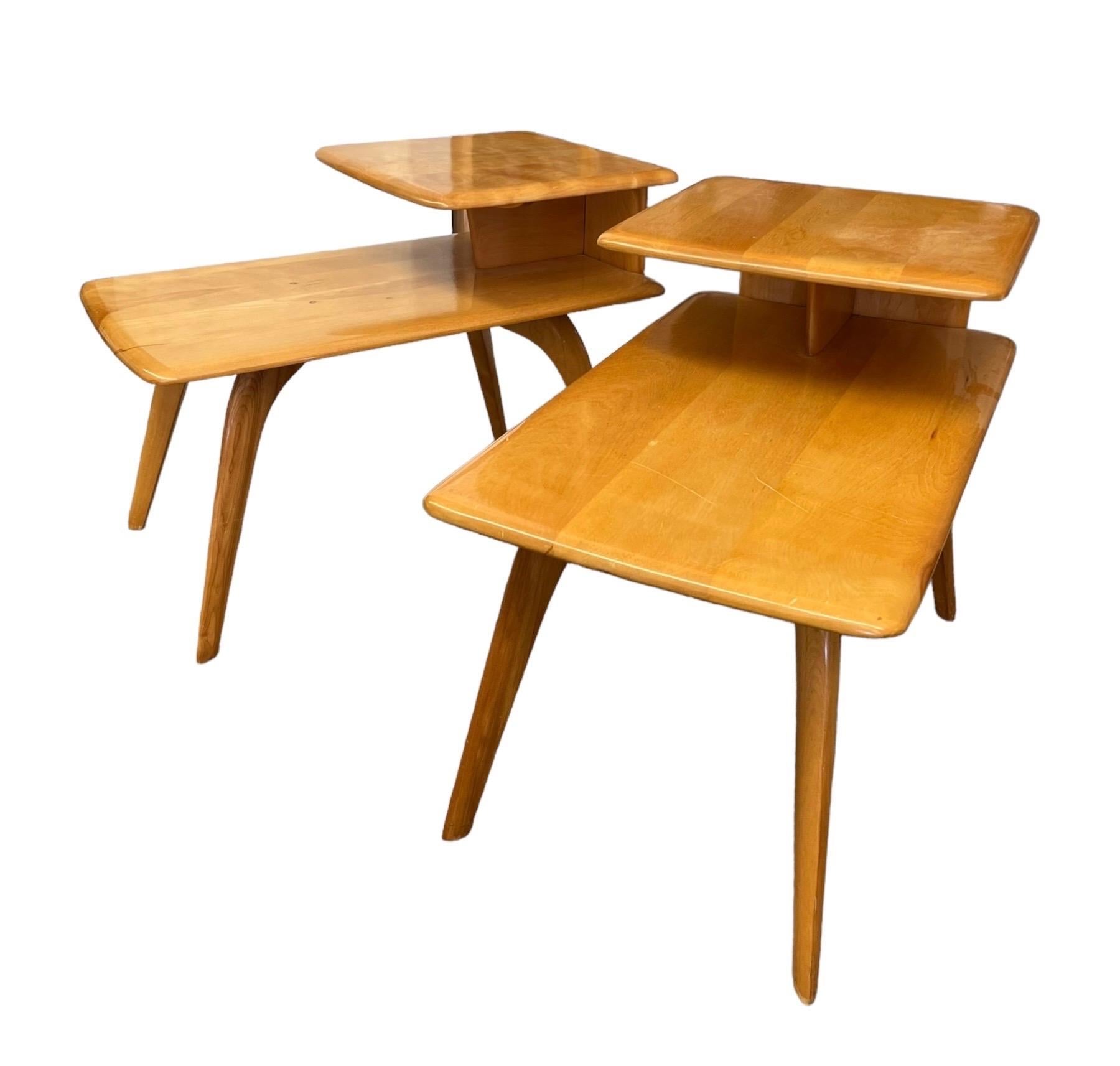 Vintage Mid Century Modern Solid Maple Step End Tables Set by Heywood Wakefield. The table retains original finish and in good overall condition. One table has wood-knot like marks, see pictures and video.

Dimensions. 17.25W 29.5D 22.5H overall
   