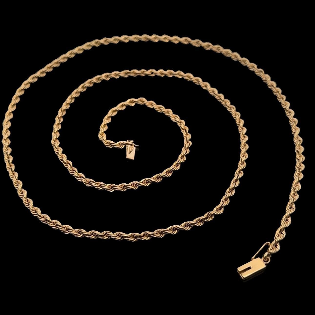 MATERIAL: Massives 14k Gelbgold 
Gewicht: 24,11 Gramm
Kettentyp: Seilglied 
Kettenlänge: 27 Zoll (gemessen neben dem Lineal)
Breite der Kette: 2,9 mm (0,11