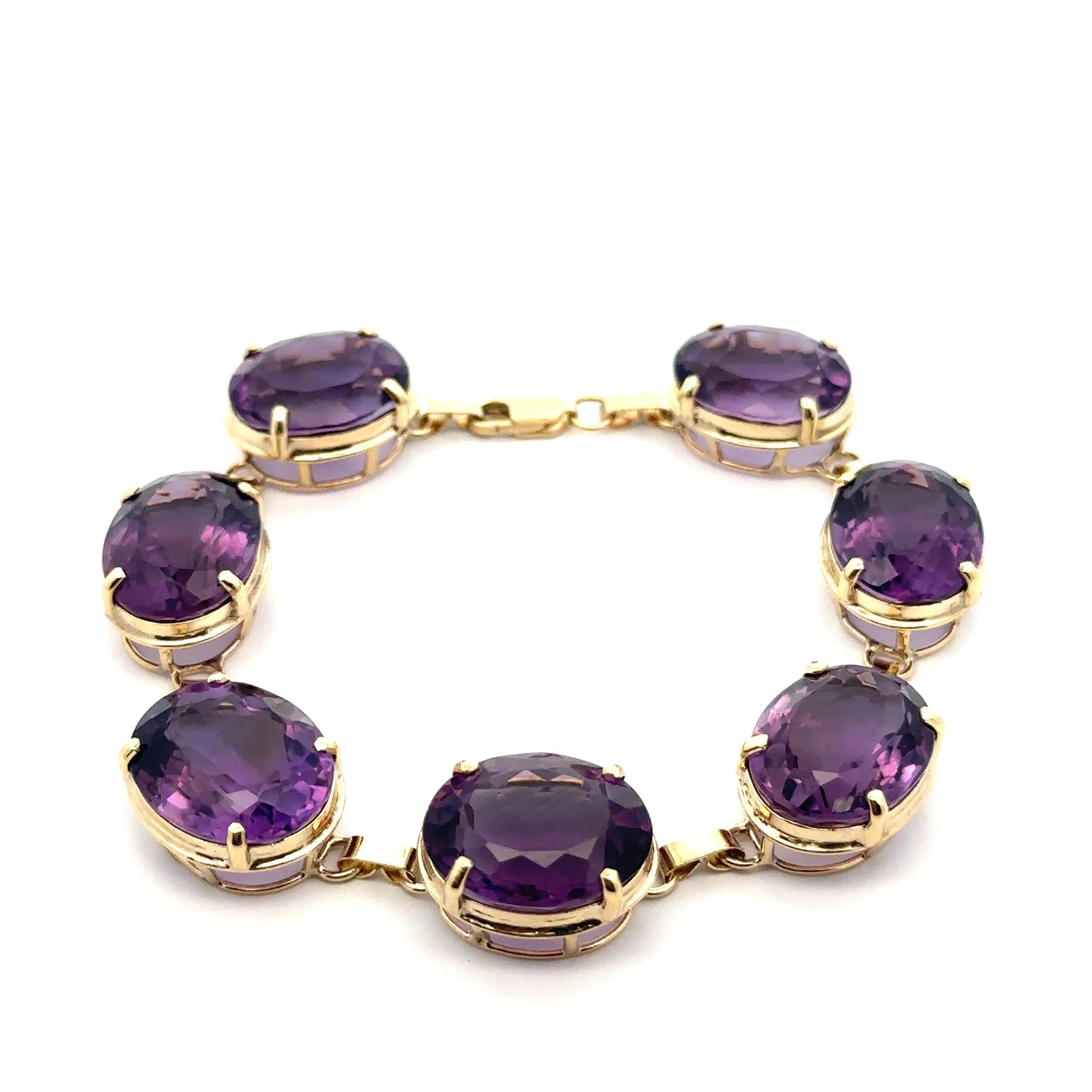 –Stone(s)–
(7) Natural Genuine Amethysts - Oval Brilliant Cut - Prong Set - Purple Color - Range from 15.9x12.8mm to 16.8x13.9mm- 50+ctw (approx.)

Material: Solid Marked 14k Yellow Gold
Weight: 27.43 Grams
Length: Measure 7 Inches Next to a Ruler.