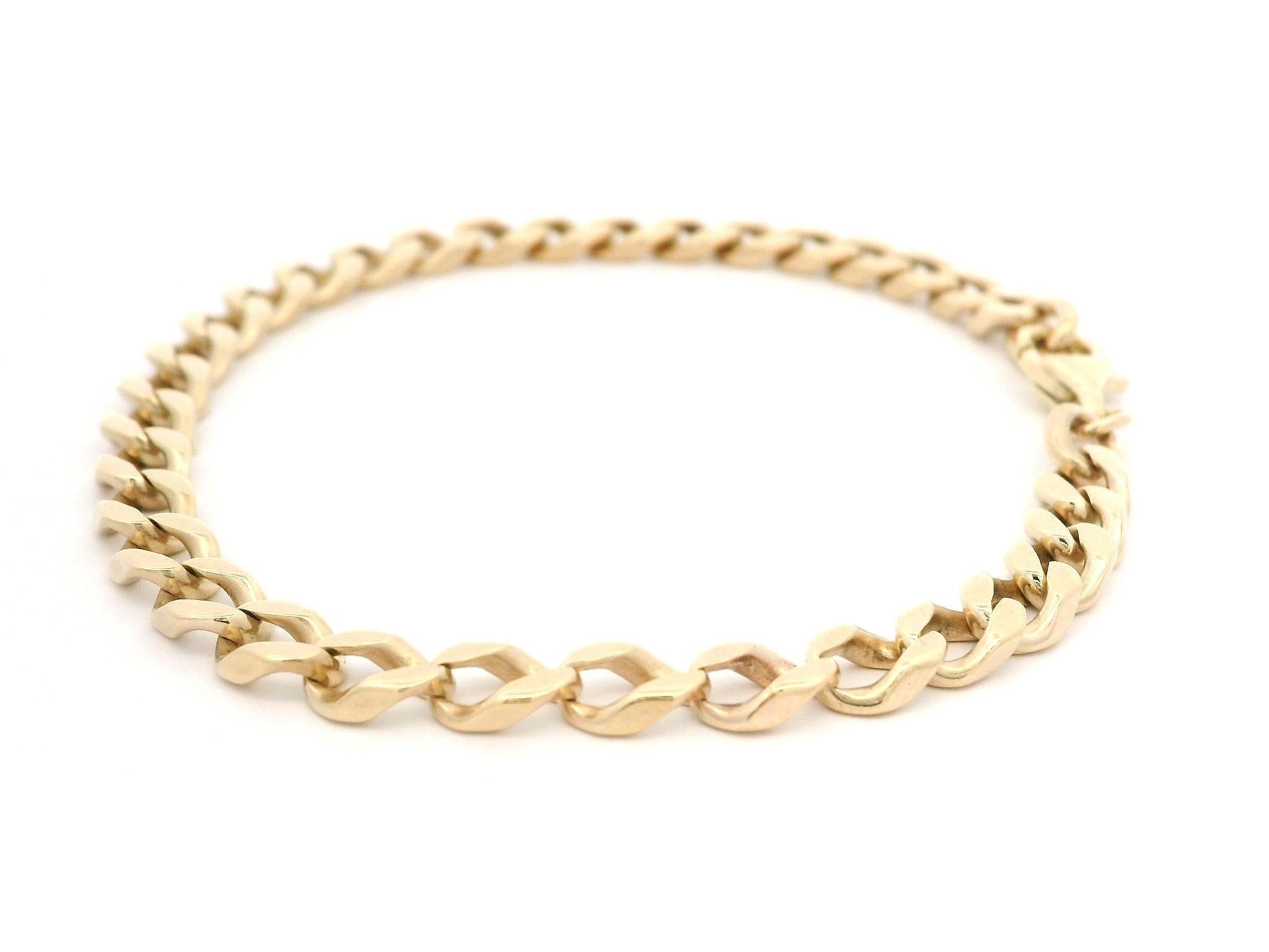 Material: Solid 10k Yellow Gold Bracelet w/ 14k Gold Clasp
Weight: 10.47 Grams
Chain Type: Cuban Curb Link
Chain Length: Measures 7.25 Inches Next to a Ruler. Will comfortably fit up to a 7.25 inch wrist (measures next to a ruler)
Chain Width: 5.2mm