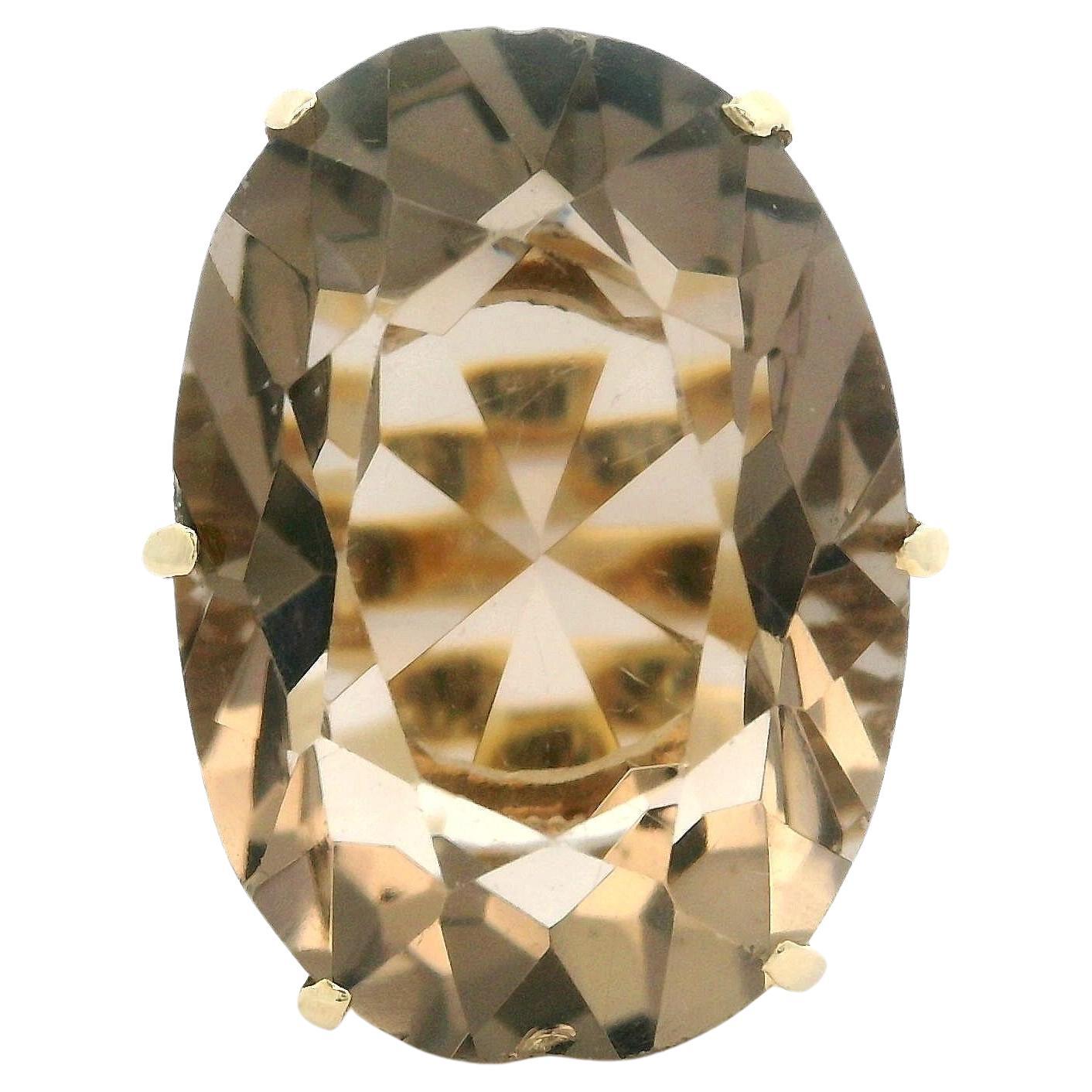 Anello d'epoca in oro giallo massiccio con quarzo fumé ovale a forma di cerchio aperto
