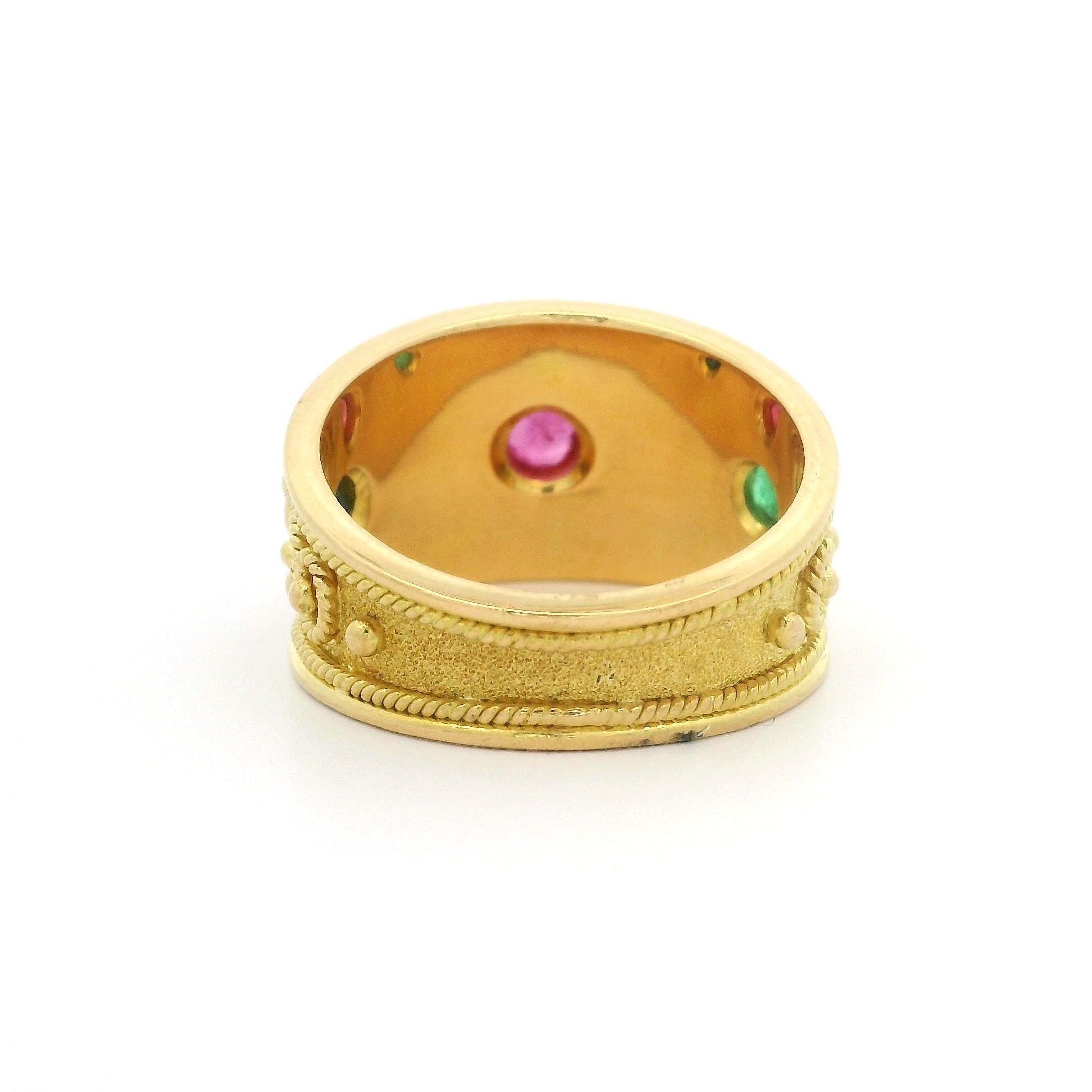–Stone(s)–
(3) Natural Genuine Ruby, Emerald & Sapphire - Round Cut - Bezel Set - Red, Green & Blue Color - Very Nice Quality - 2.5mm to 3.2mm (approx.) 

Material:  Solid 18K Yellow Gold
Weight: 8.10 Grams
Ring Size: 7.5 (Fitted on a finger, please