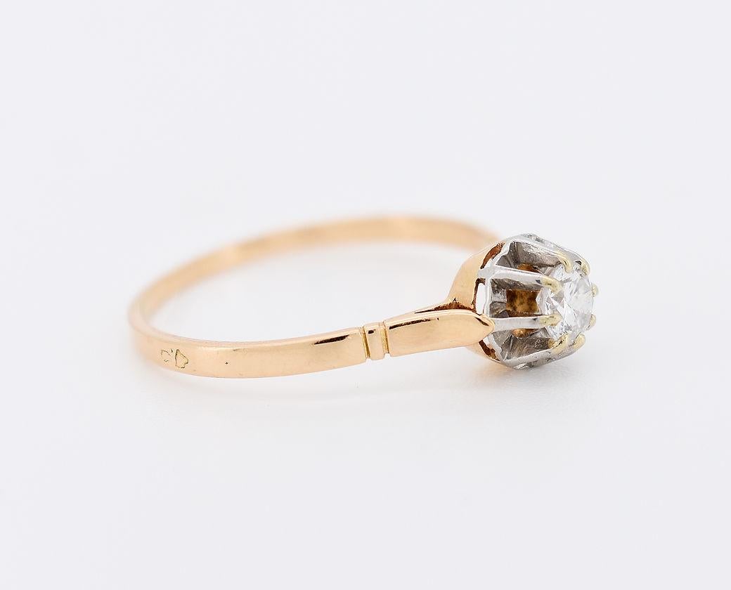 Vintage solitaire (circa 1970) in 18-carat yellow gold (750 thousandths) and platinum. It is adorned with an approximately 0.30-carat round brilliant diamond (5 x 5 x 3 mm).

Detailed characteristics:

Weight: 2.5g
Size: 63 FR (10.5 US - U 1/2