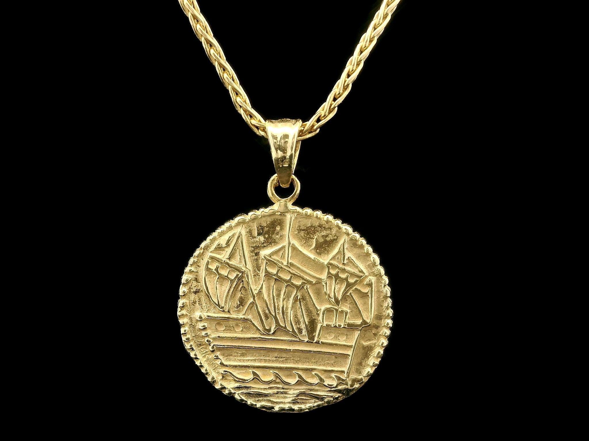Material: Oro amarillo macizo de 14 quilates
Peso: 12.9 gramos
Tipo de cadena: 18