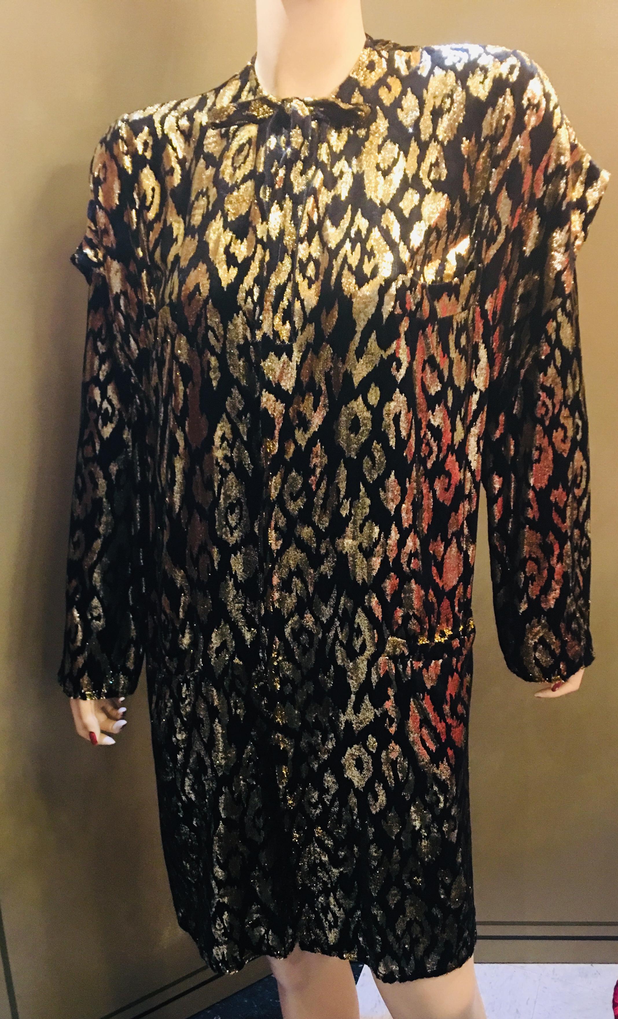 Exquisite 1980's evening wear coat, jacket, blazer or duster is lightweight, vented and easy to wear for dining, parties and dancing, with an animal patterned, soft silk velvet and shiny gold lame metallic velvet effect.  Collarless coat features