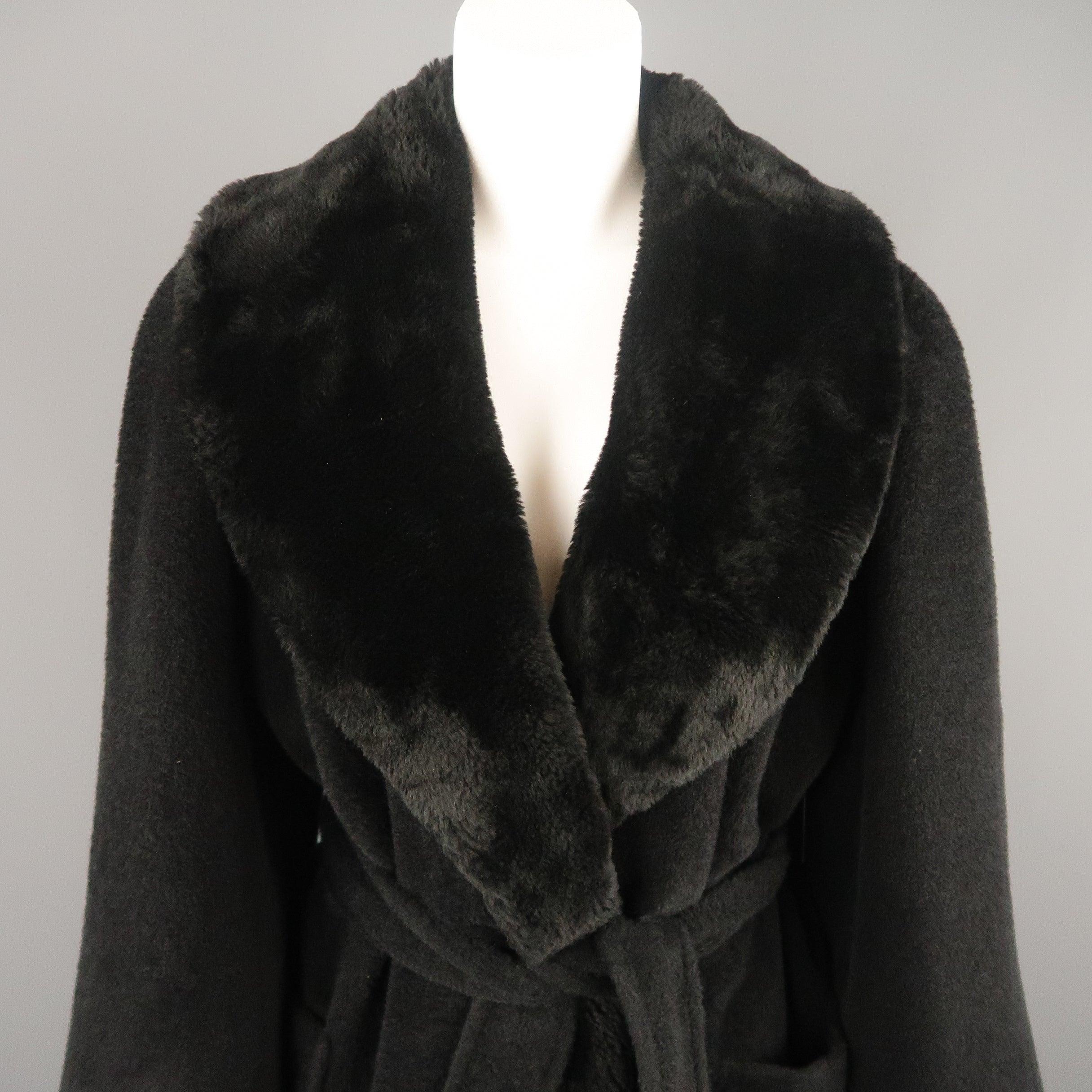 Vintage SONIA RYKIEL for BERGDORF GOODMAN coat comes in black faux fur with a shawl collar, patch pockets, and tied belt waist. Made in France.
Very Good Pre-Owned Condition.
 

Marked:   (no size)
 

Measurements: 
  
l	Shoulder: 21 inches 
l	Bust: