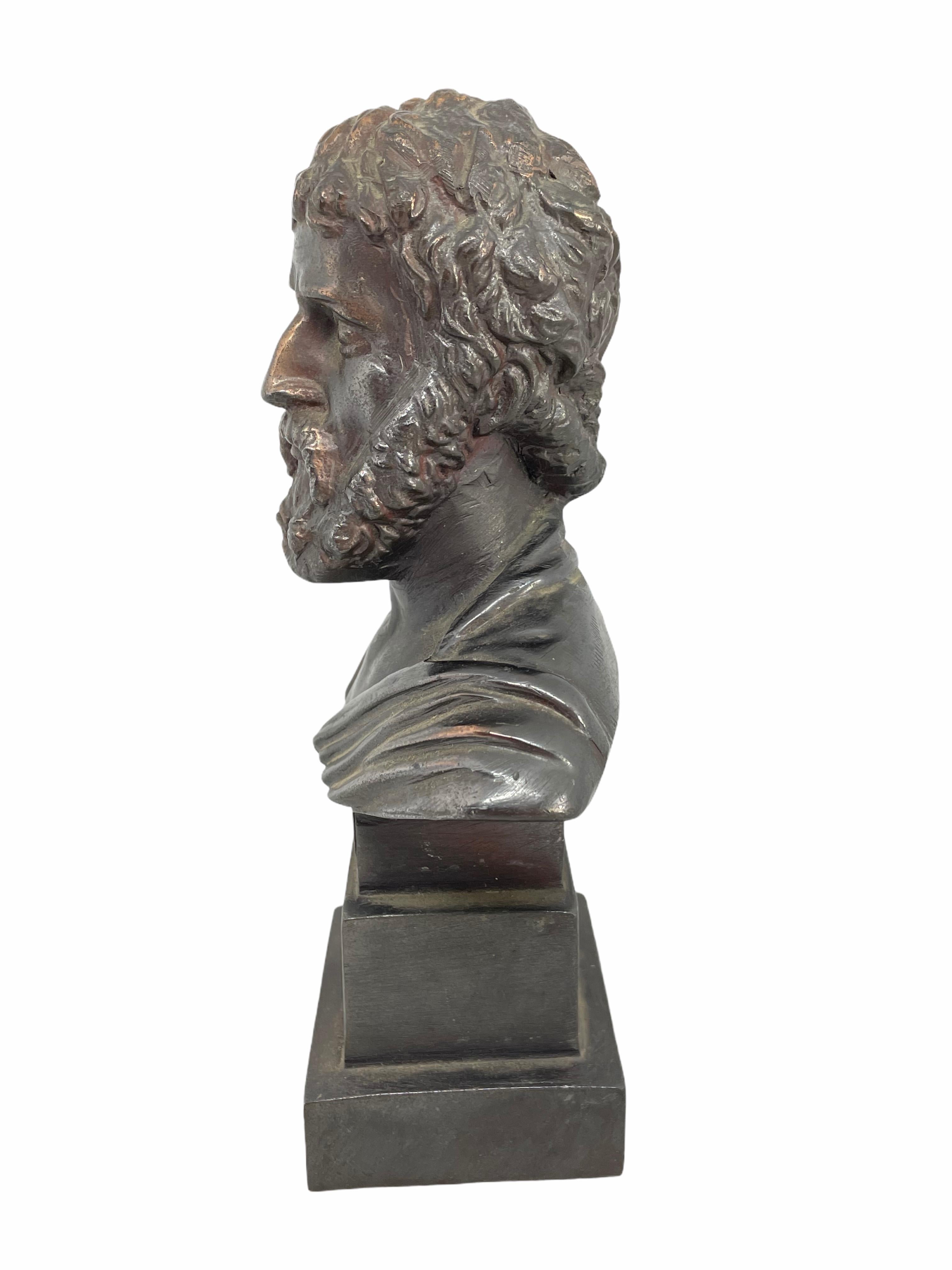 A classic decorative Bust statue. Some wear with a nice patina, but this is old-age. Made of metal. Very decorative and nice to display in your library or any room.