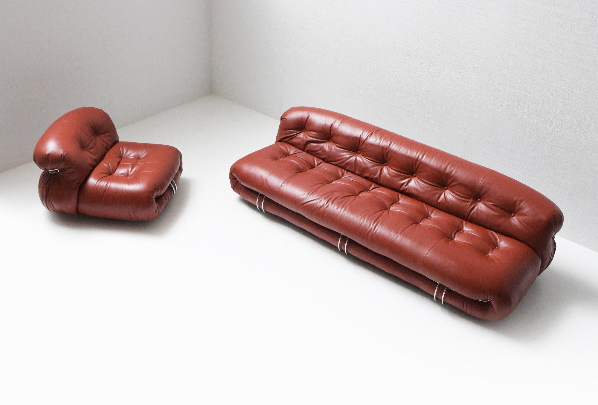 Great Soriana sofa set in new, thick red leather.

Designed by Afra e Tobia Scarpa for Cassina, Italy, 1970s 

The Soriana series was meant to express beauty and comfort by using a whole bundle of leather held by a chrome-plated steel clamp. 
The