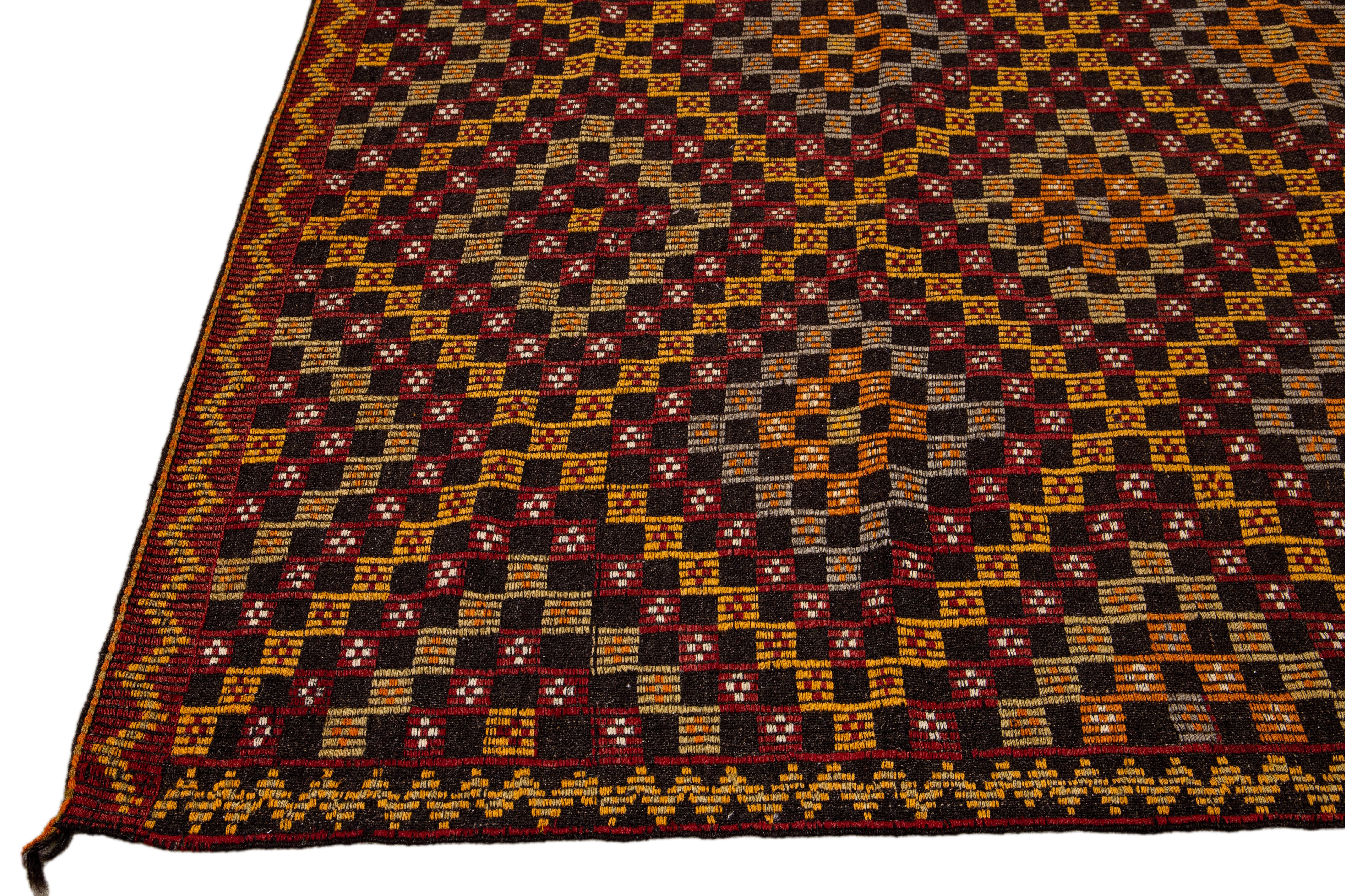 Indian Vintage Soumak Handmade Geometric Designed Brown Wool Rug For Sale