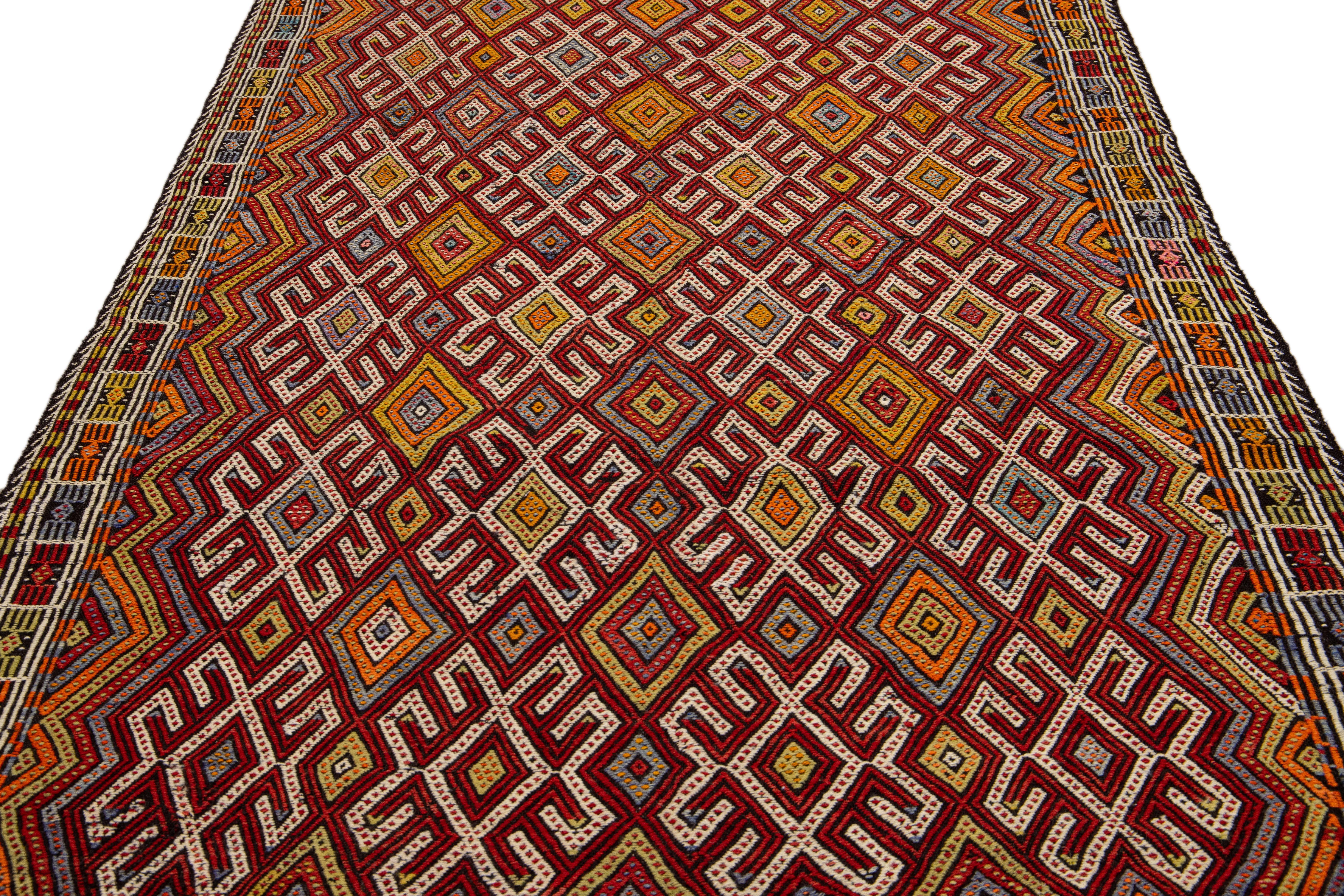 Bohemian Vintage Soumak Handmade Geometric Designed Multicolor Wool Rug For Sale