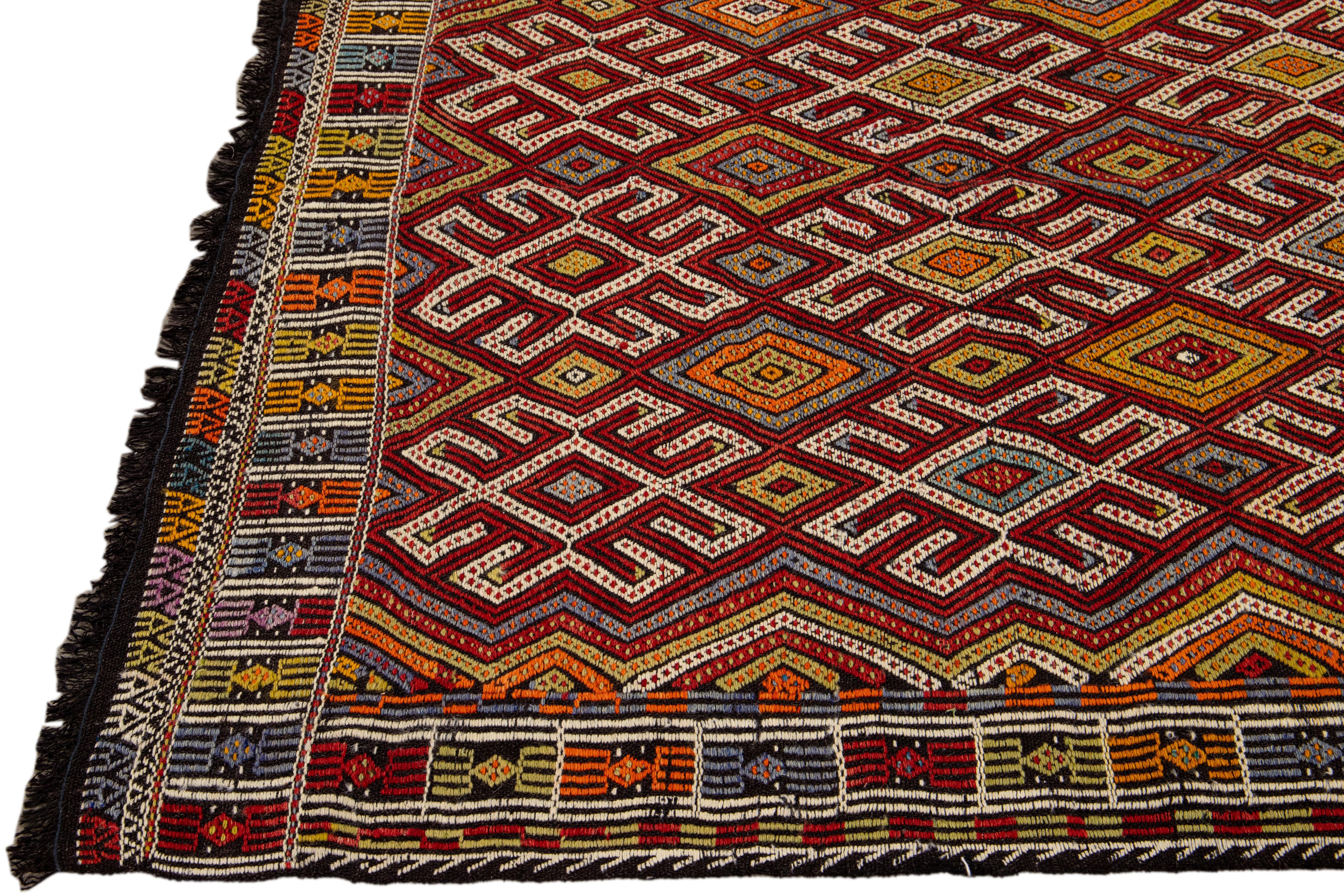 Indian Vintage Soumak Handmade Geometric Designed Multicolor Wool Rug For Sale