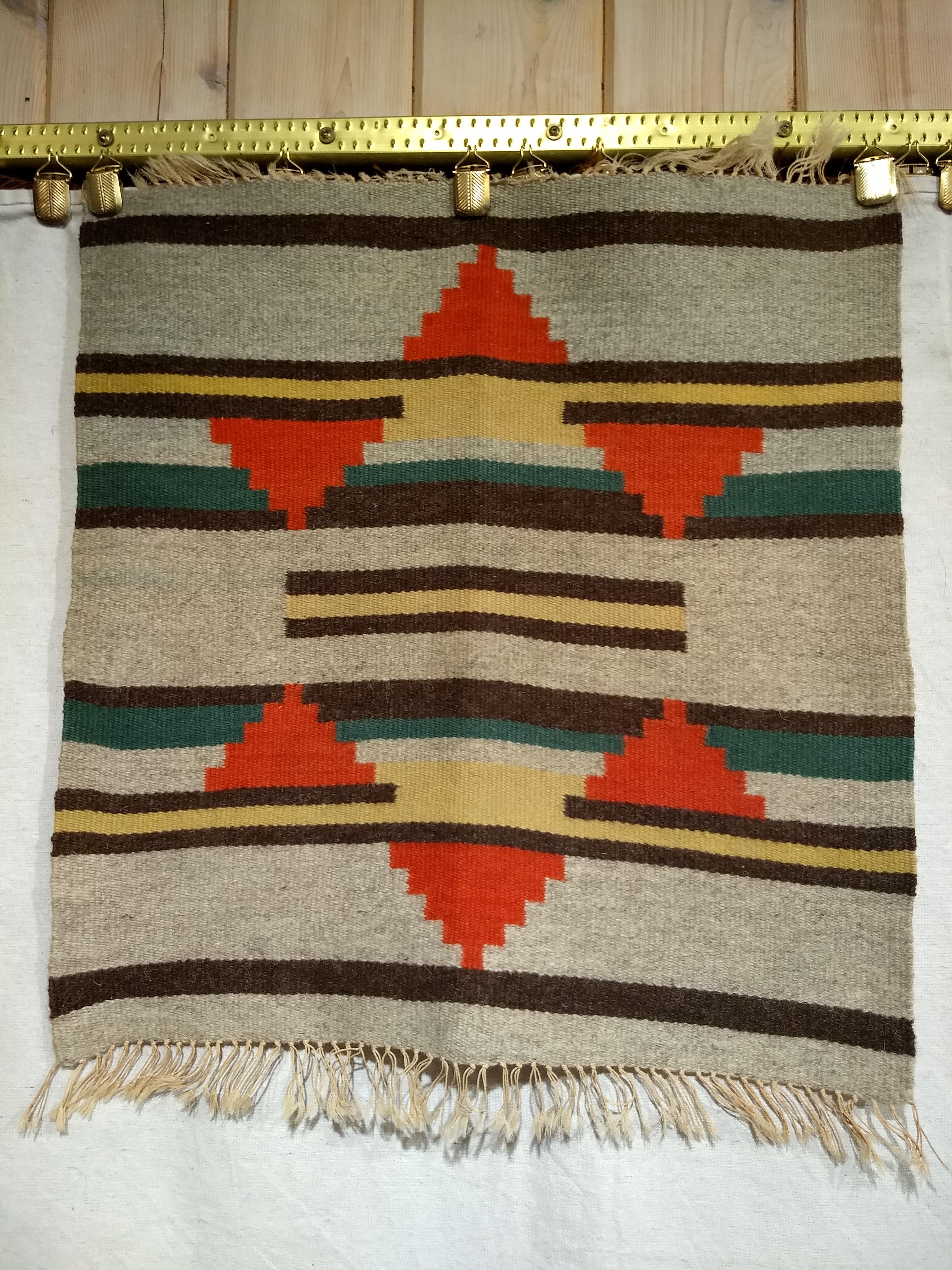 Hand-Woven Vintage Native American Navajo Rug in a Geometric Pattern in Earth Tone Colors For Sale