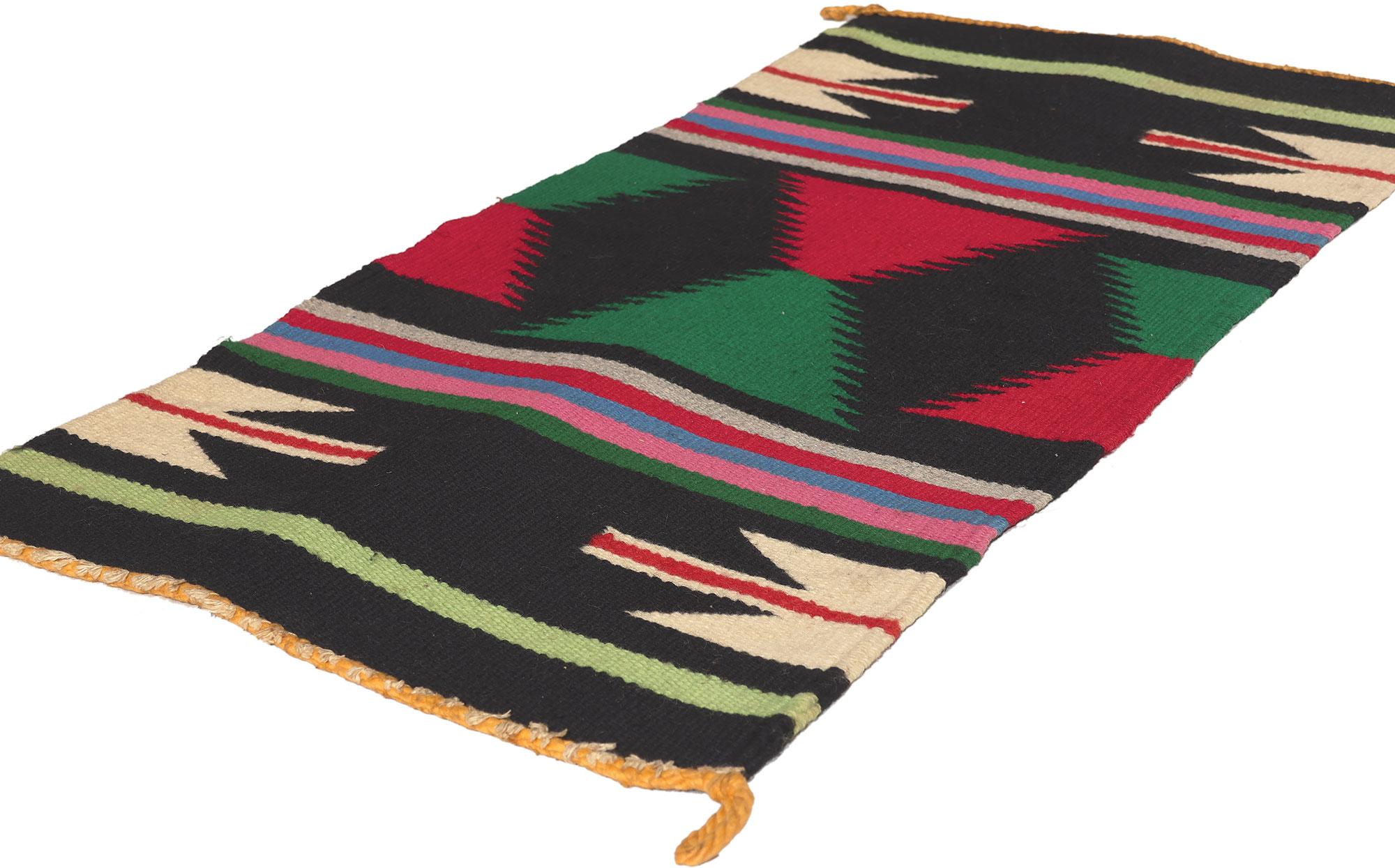 78628 Vintage Pueblo Textile, 01'06 x 03'01.
Maximalism meets boho chic in this handwoven vintage Southwest Pueblo kilim rug. The eclectic sensibility and lively colors woven into this piece create a maximalist boho chic style. The abrashed black