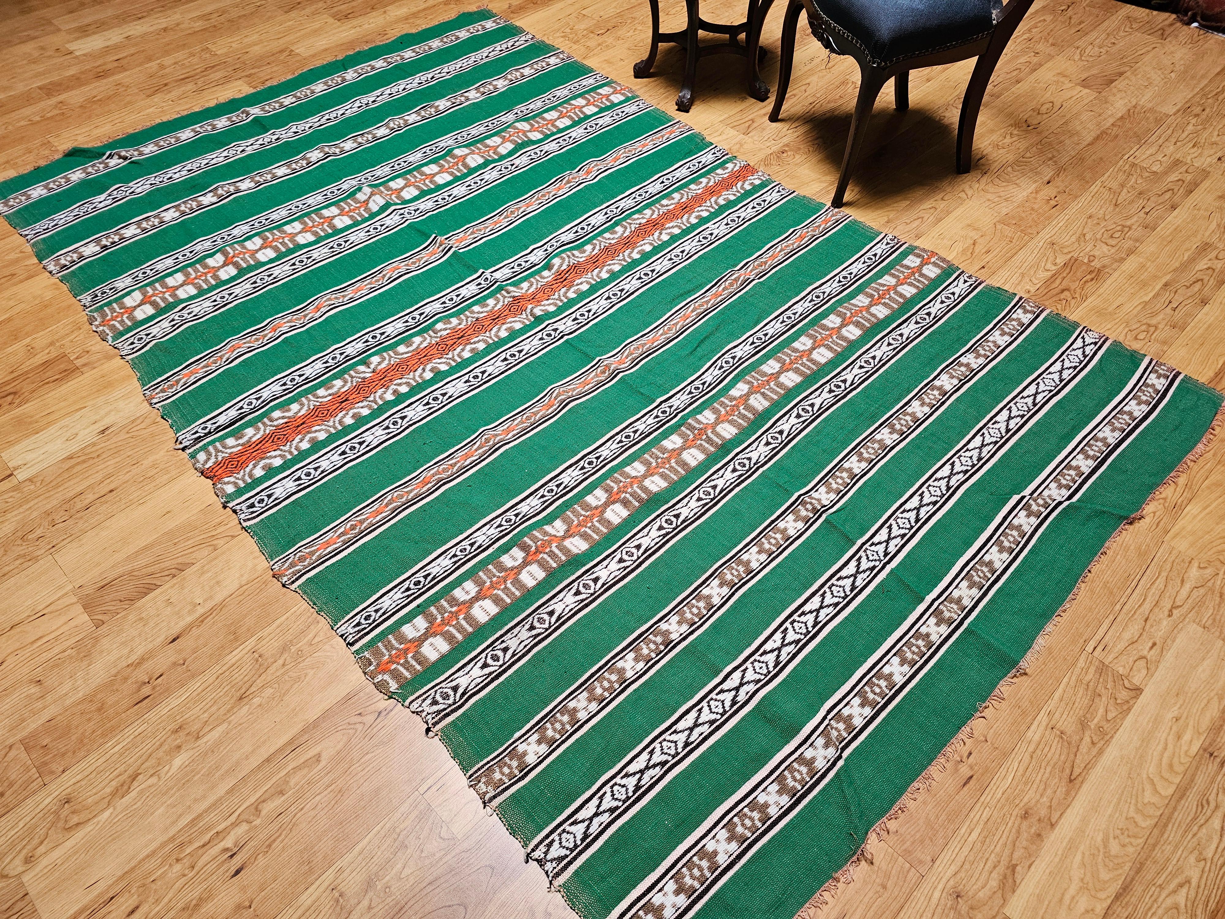 Manta vintage de tejido plano del suroeste en verde, marfil, marrón, naranja y negro en venta 4