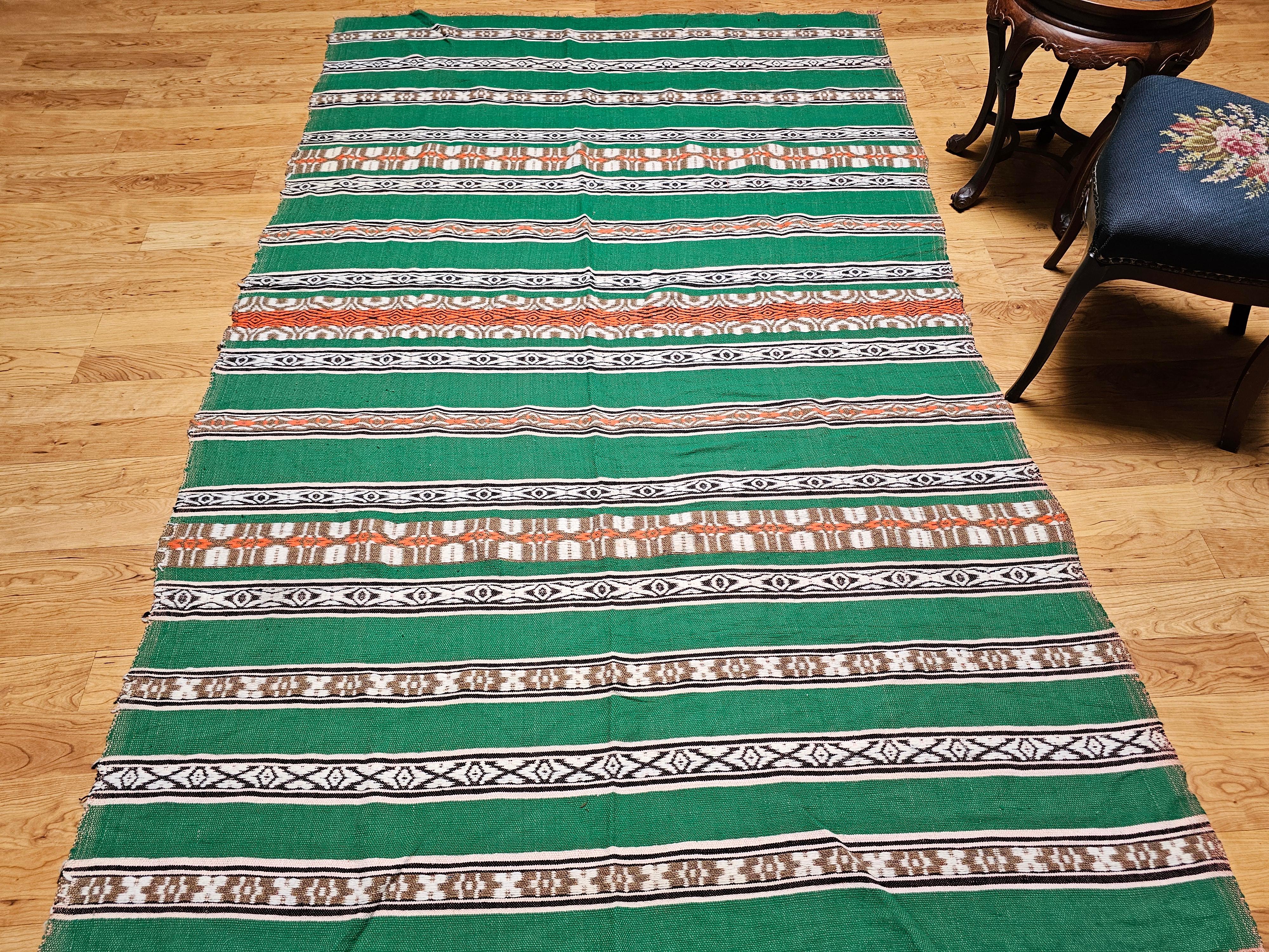Manta vintage de tejido plano del suroeste en verde, marfil, marrón, naranja y negro en venta 5