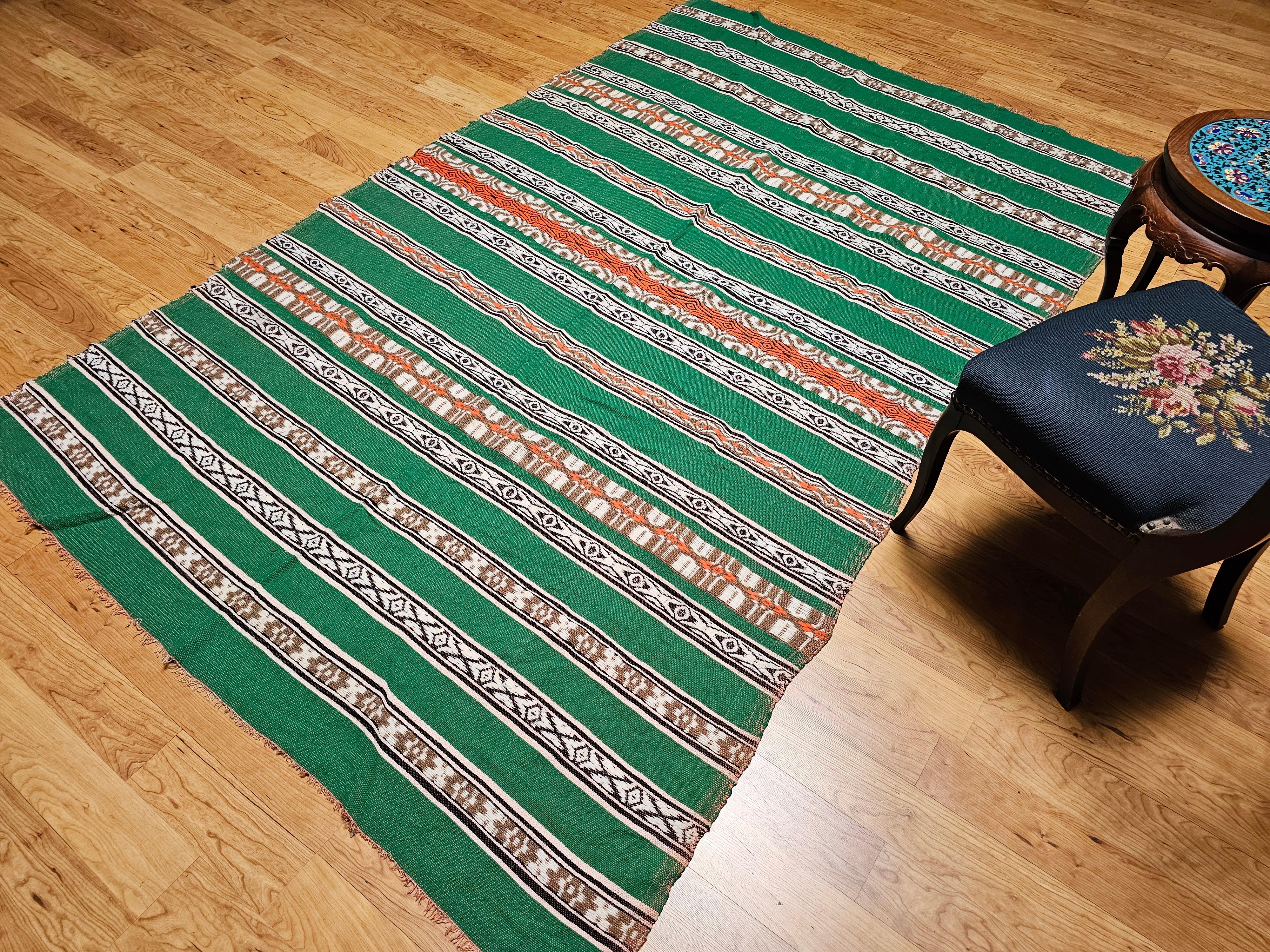 Manta vintage de tejido plano del suroeste en verde, marfil, marrón, naranja y negro en venta 6