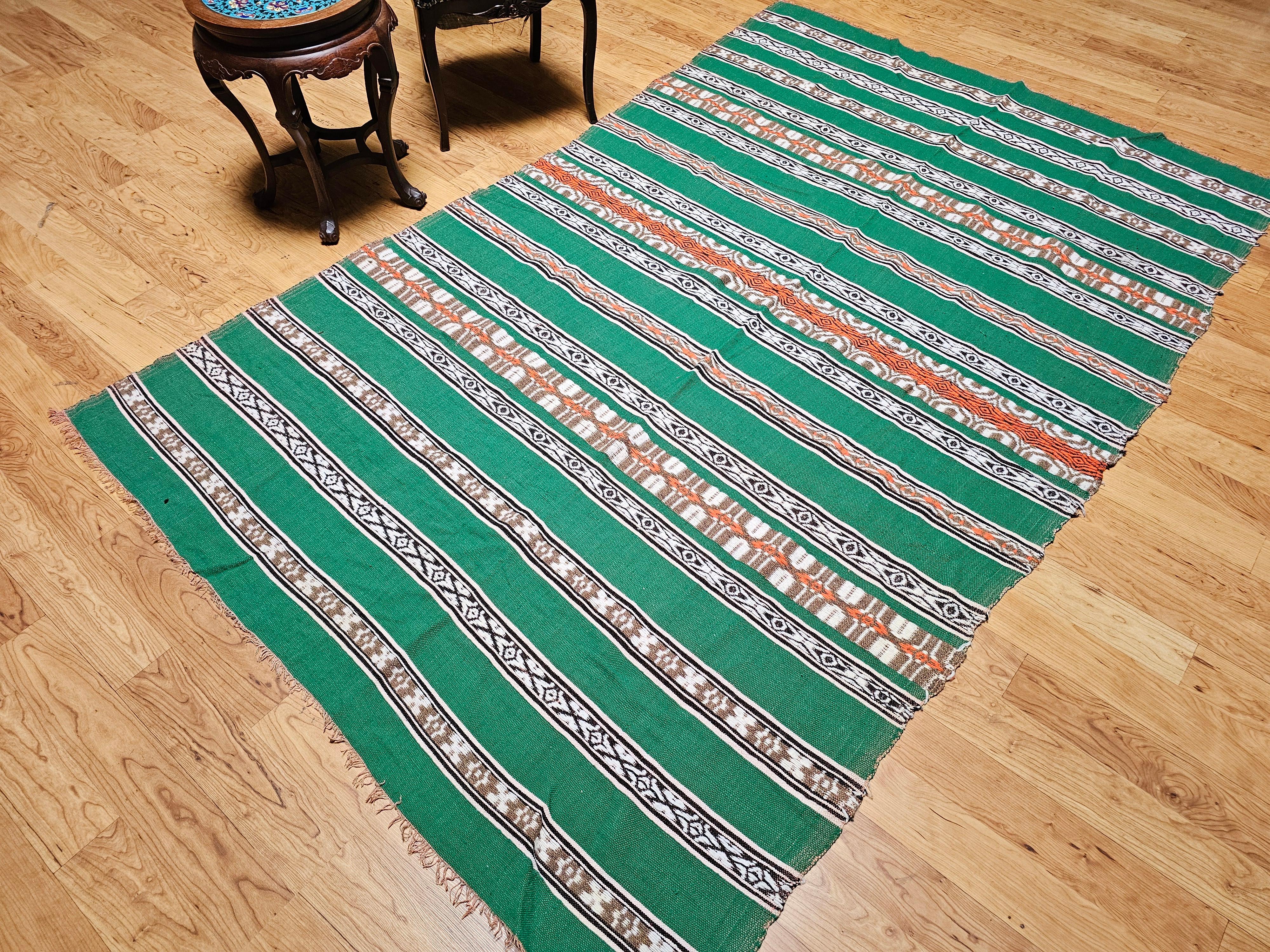 Manta vintage de tejido plano del suroeste en verde, marfil, marrón, naranja y negro en venta 9