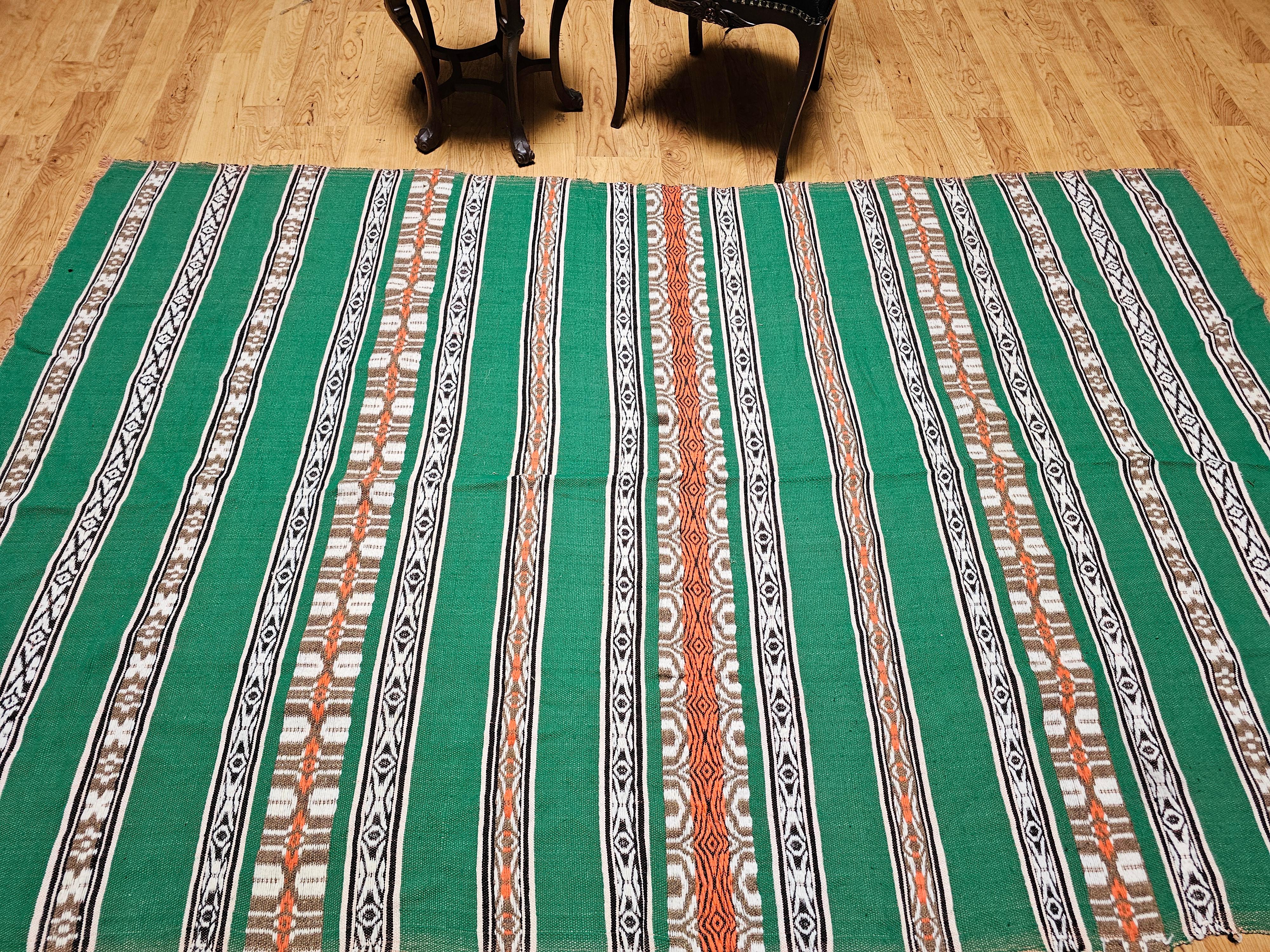 Manta vintage de tejido plano del suroeste en verde, marfil, marrón, naranja y negro en venta 10