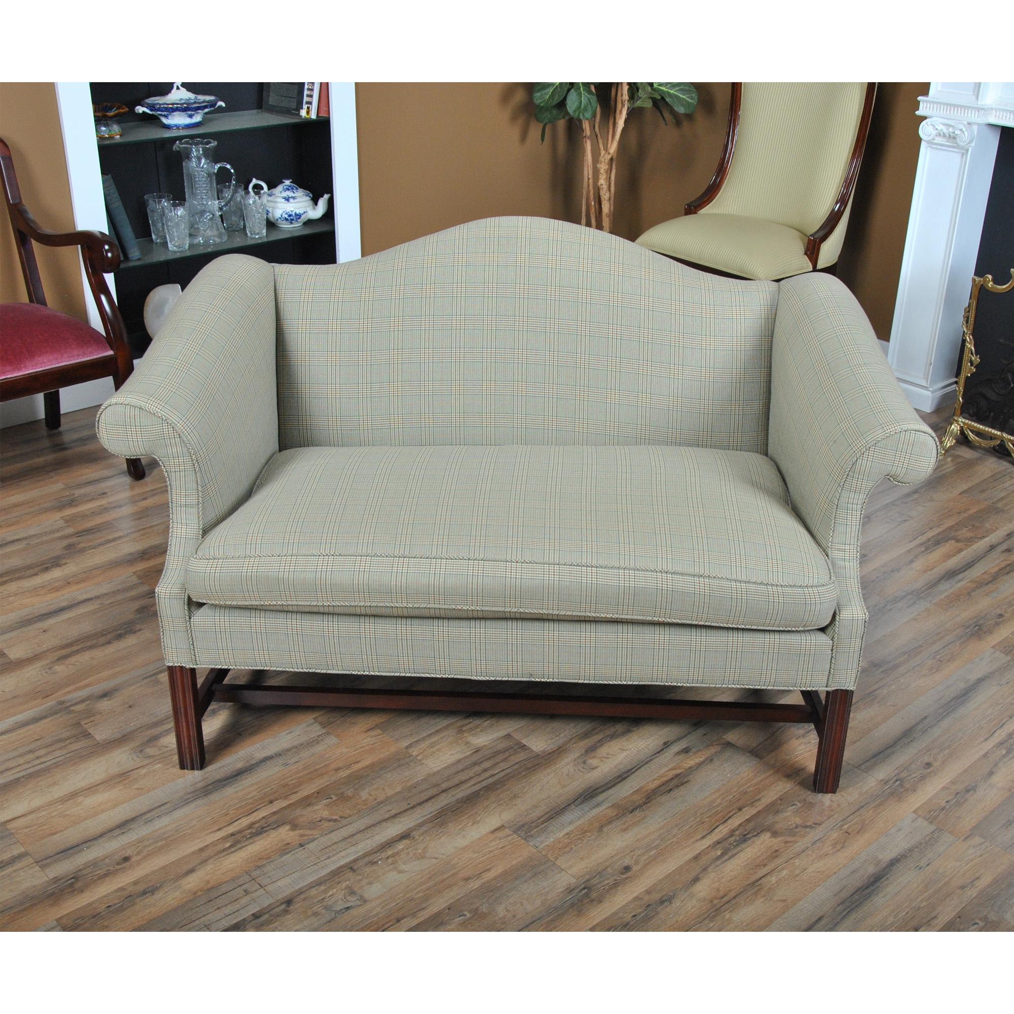 This Vintage Southwood Loveseat is impressive with it’s boldly colored fabric. Superbly crafted in the USA using finest quality materials solid mahogany for the frame and such as duck down and duck feathers for the cushion, this Loveseat has a great