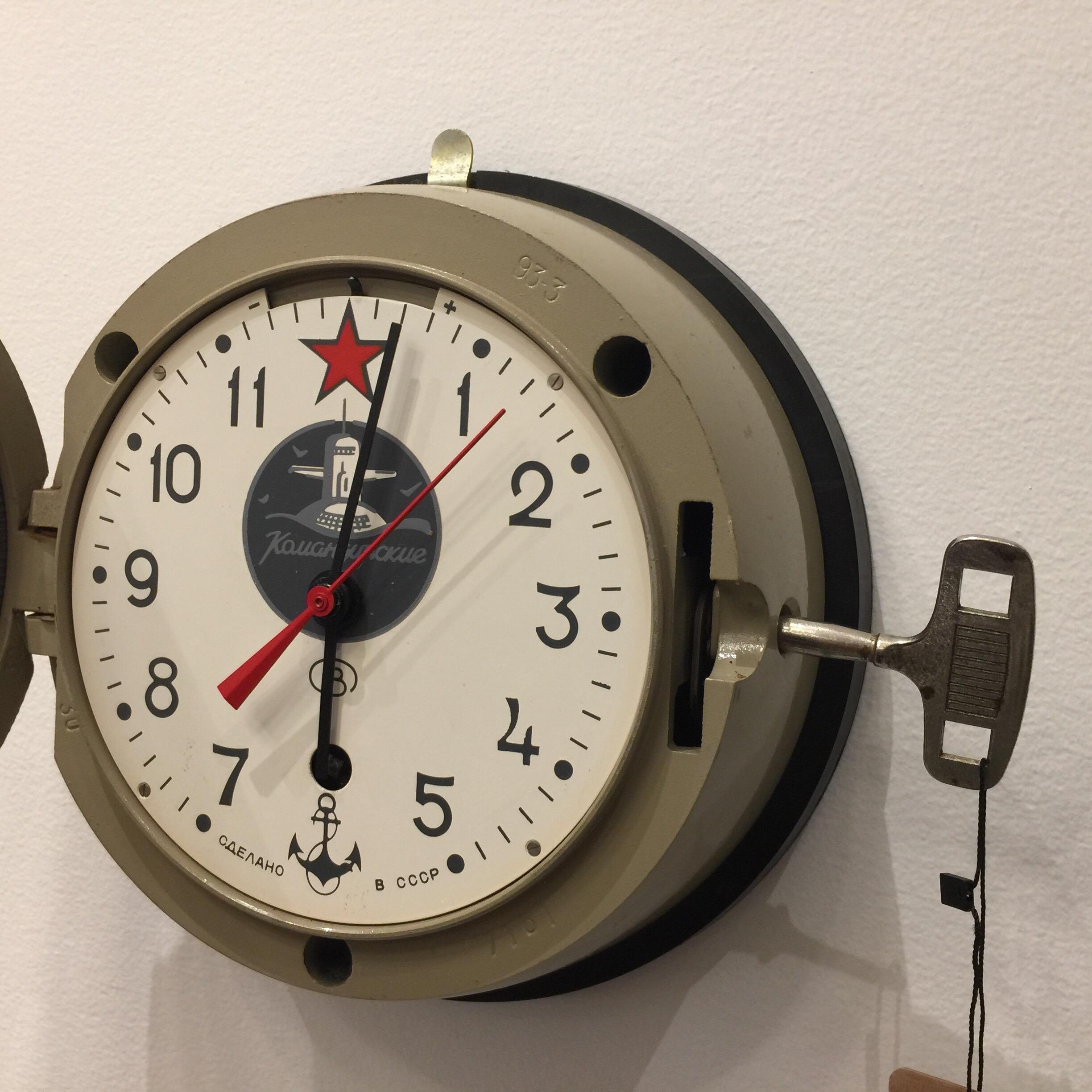 This wind-able Soviet (Russian Likely) submarine clock is in pristine vintage condition and working perfectly! All original winding key and face which opens for setting the time. This is whimsical and collectible from the height of the Iron Curtain