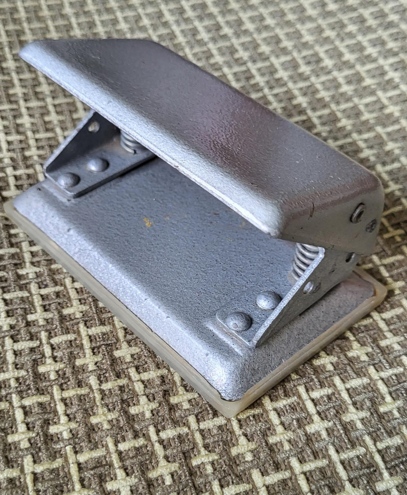 Step back in time with this vintage paper punch from the Soviet Union, known as a 