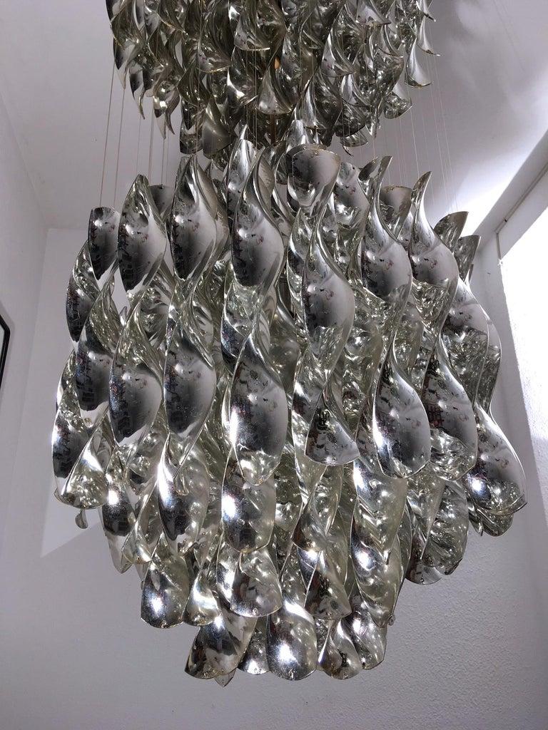 Vintage silver spiral SP2 pendant lamp by Verner Panton produced by J. Lüber in Switzerland ca. 1968
Very good condition. All original. Complete.
Stunning lighting effect. 
H 150 x D 48 cm