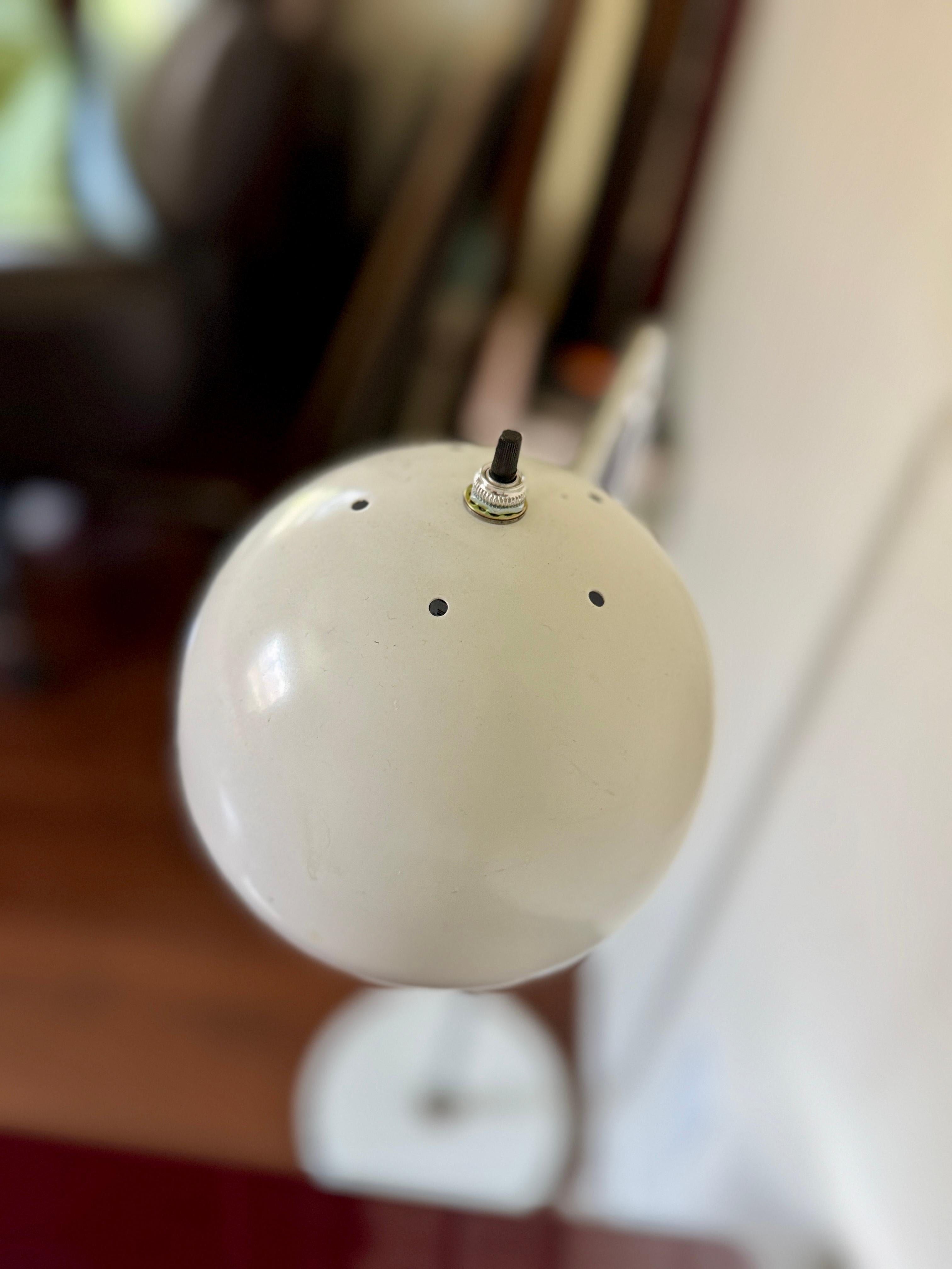 Chrome Vintage space age adjustable chrome floor lamp with white accents, circa 1970s For Sale