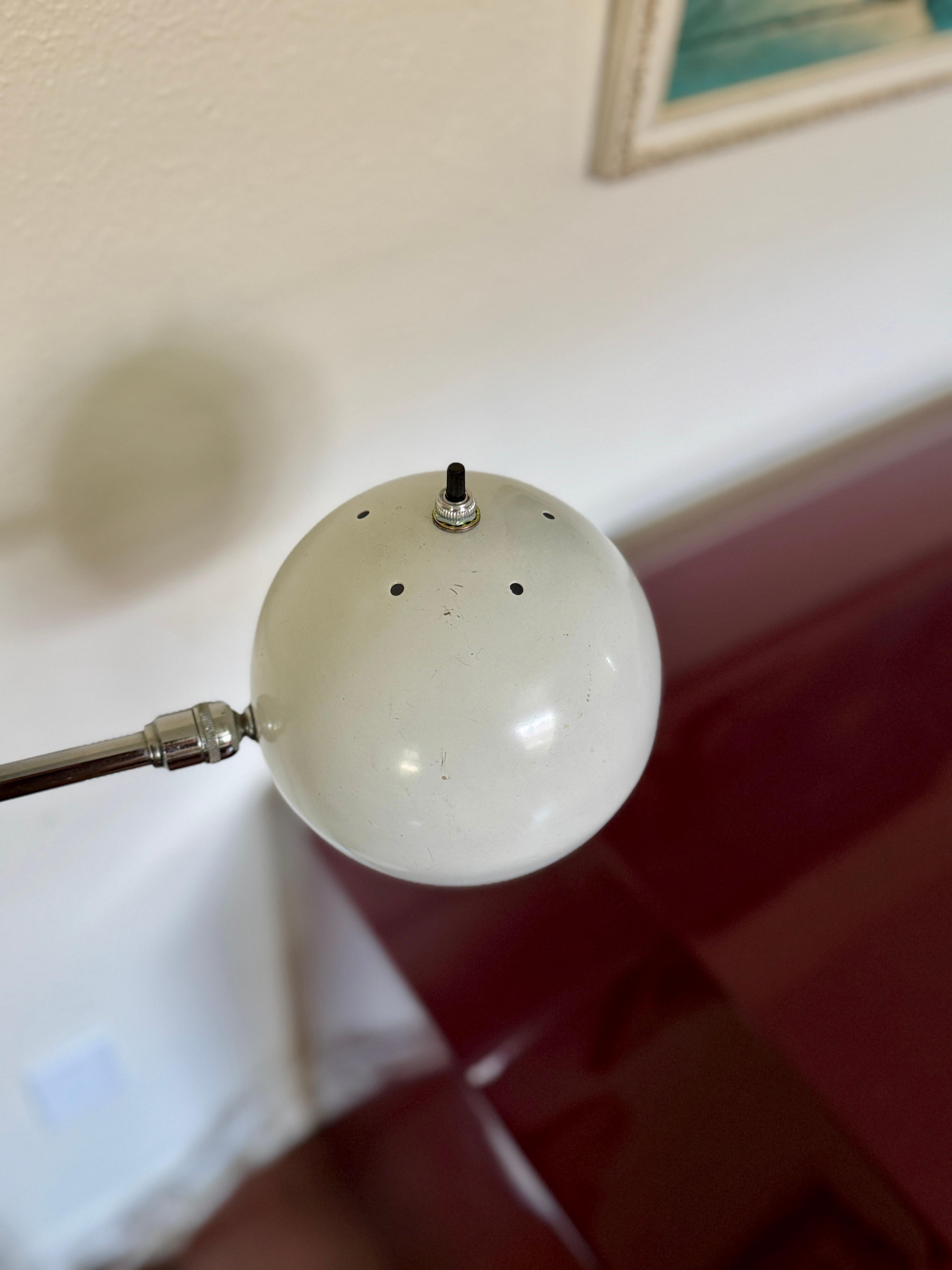 Vintage space age adjustable chrome floor lamp with white accents, circa 1970s For Sale 1