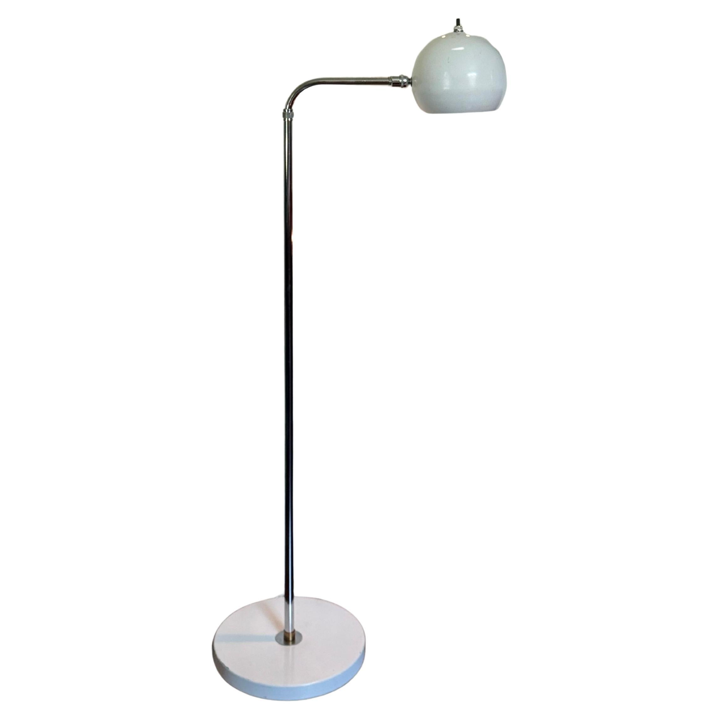 Vintage space age adjustable chrome floor lamp with white accents, circa 1970s For Sale