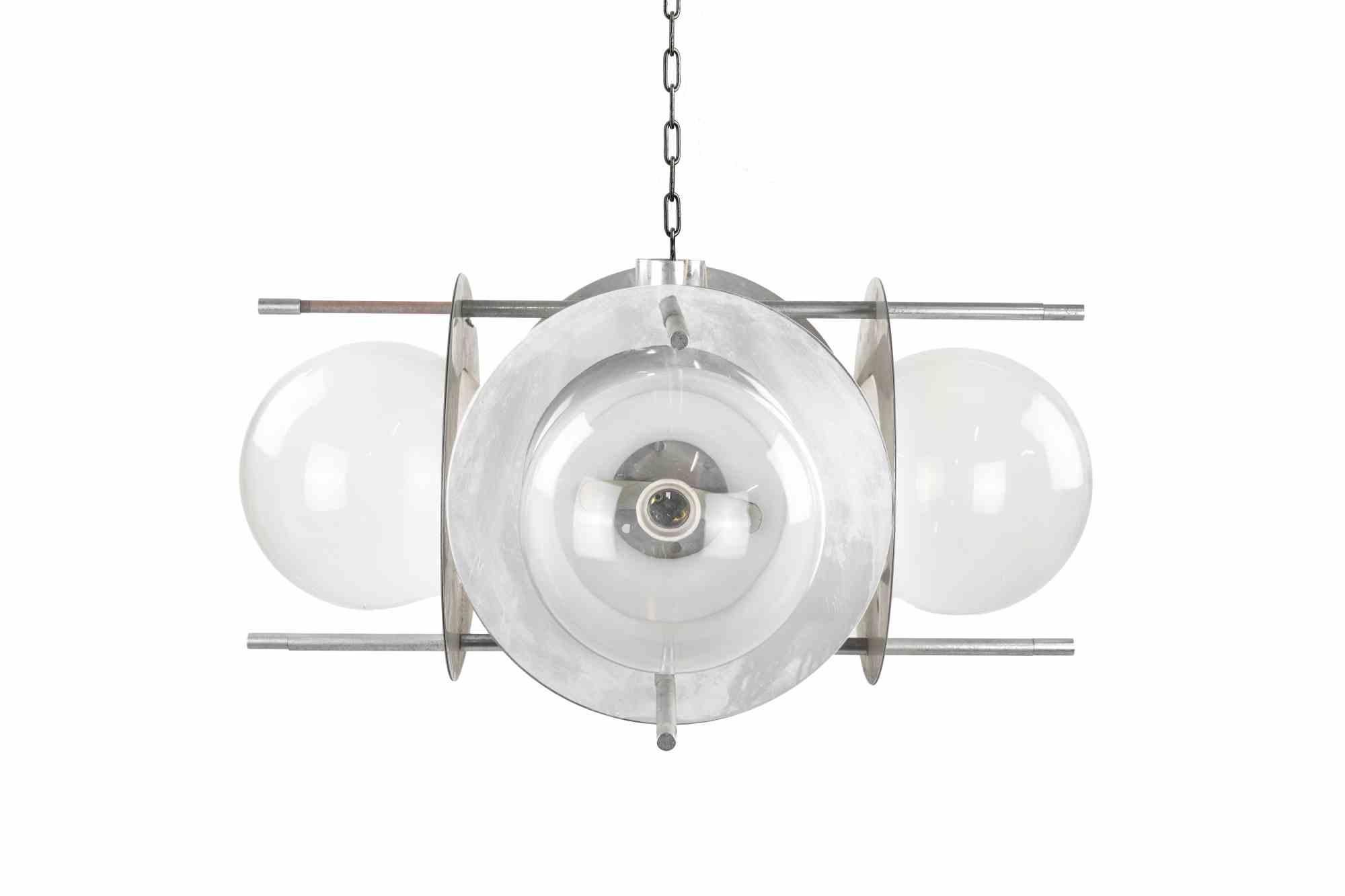 Lampe lustre Vintage NO AGE réalisée en Italie en 1970.

4 lampes.

Câblé et en bon état.