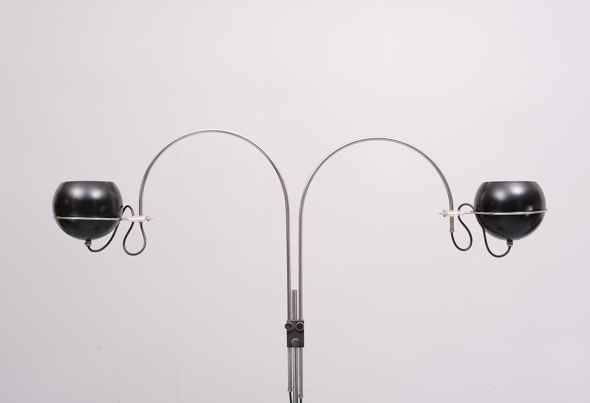 Mid Century Modern GEPO Amsterdam  Double Arc Space Age Eyeball Floor Lamp.
The arcs can be adjusted in height and turned all around. The Black eyeball shades can be positioned inside or outside the arcs and placed in the rings in any direction