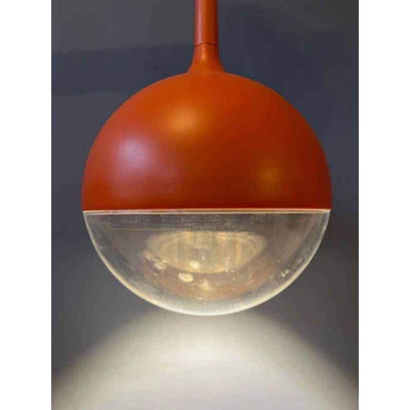 The classic Ikea Väster ceiling lamp in orange colour. The lamp has a somewhat unusual, roster-like light source (comes included).

Dimensions:
ø Shade: 30 cm
Height Shade: 40 cm

Condition: Excellent condition. The transparant part of the