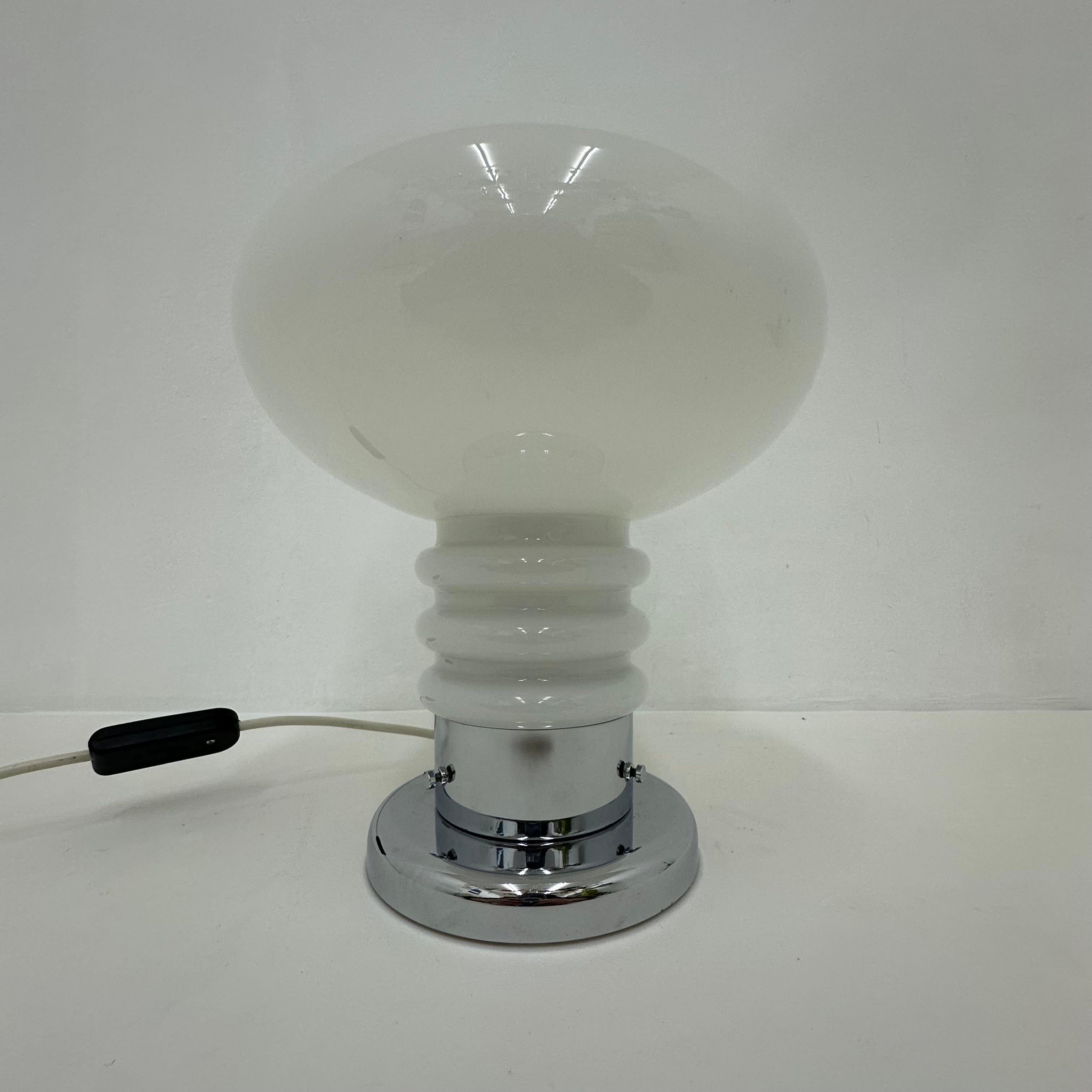 Vintage space age table lamp opaline and chrome , 1970’s

Dimensions: 32 cmH, 23cm Diameter
Material: Glass , metal
Color: White , silver

