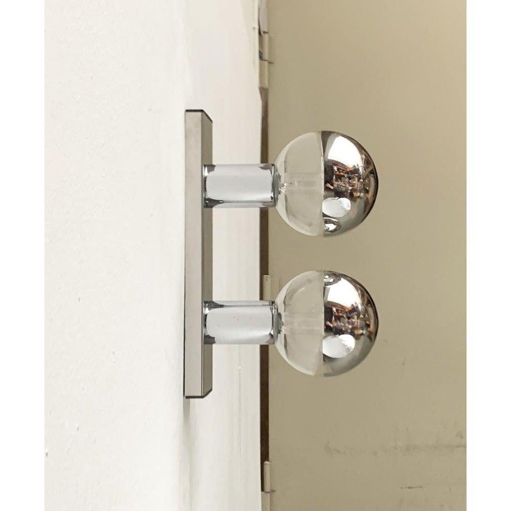 Imposing mid century ceiling or wall light from staff according to a design by the japanese designer motoko ishii.

this design convinces with its reflective surfaces. The game with reflections creates a special depth. The reflective areas double