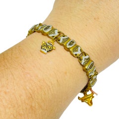 Vintage SPAIN damascene gold tone black panel link charm designer bracelet