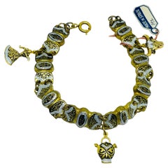 Vintage SPAIN damascene gold tone black panel link charm designer bracelet