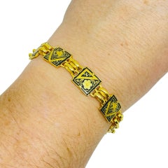 Vintage SPAIN damascene gold tone black panel link designer bracelet
